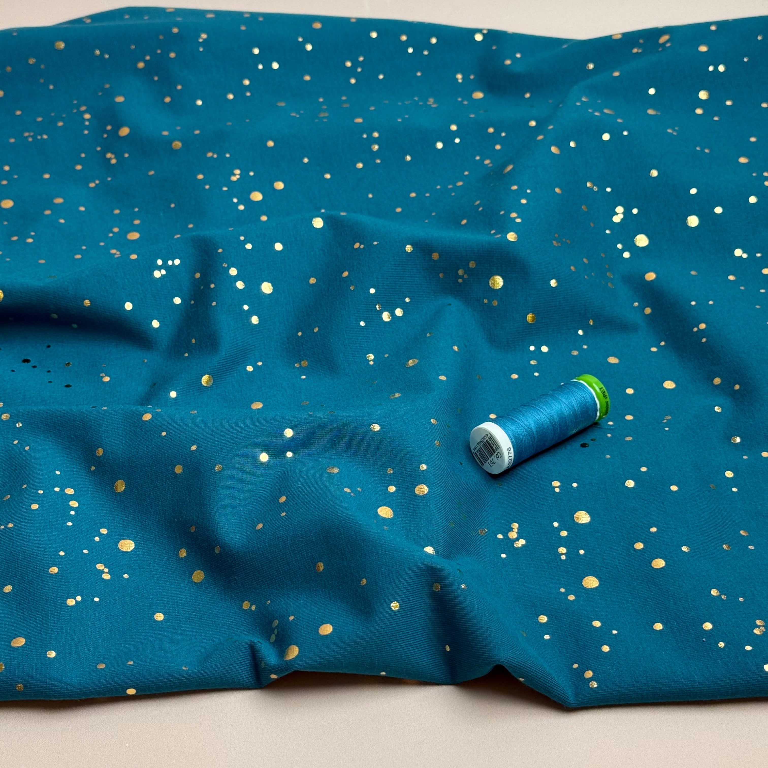 Gold Confetti on Petrol Cotton Jersey Fabric