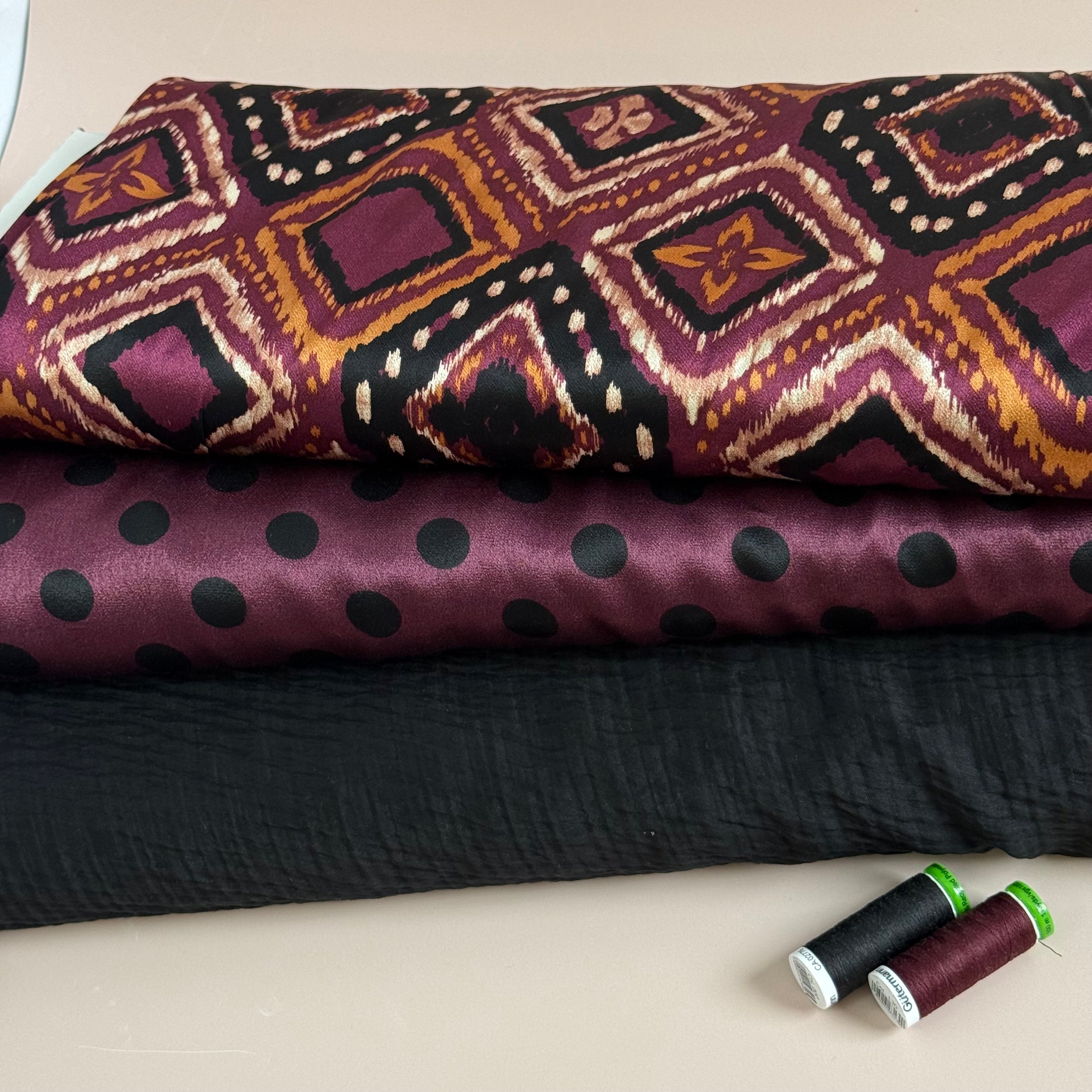 Polka Black on Wine Spun Viscose Sateen Fabric
