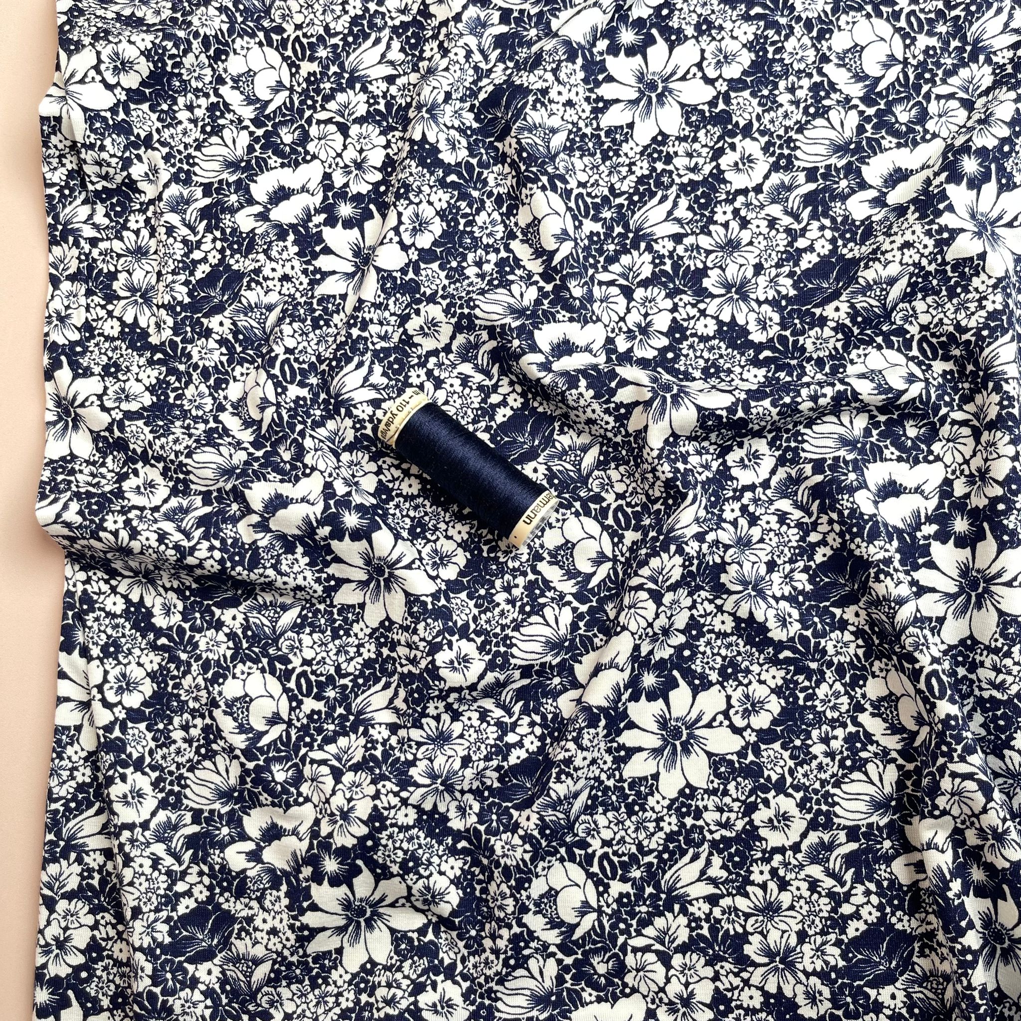 White Flowers on Navy Viscose Jersey Fabric