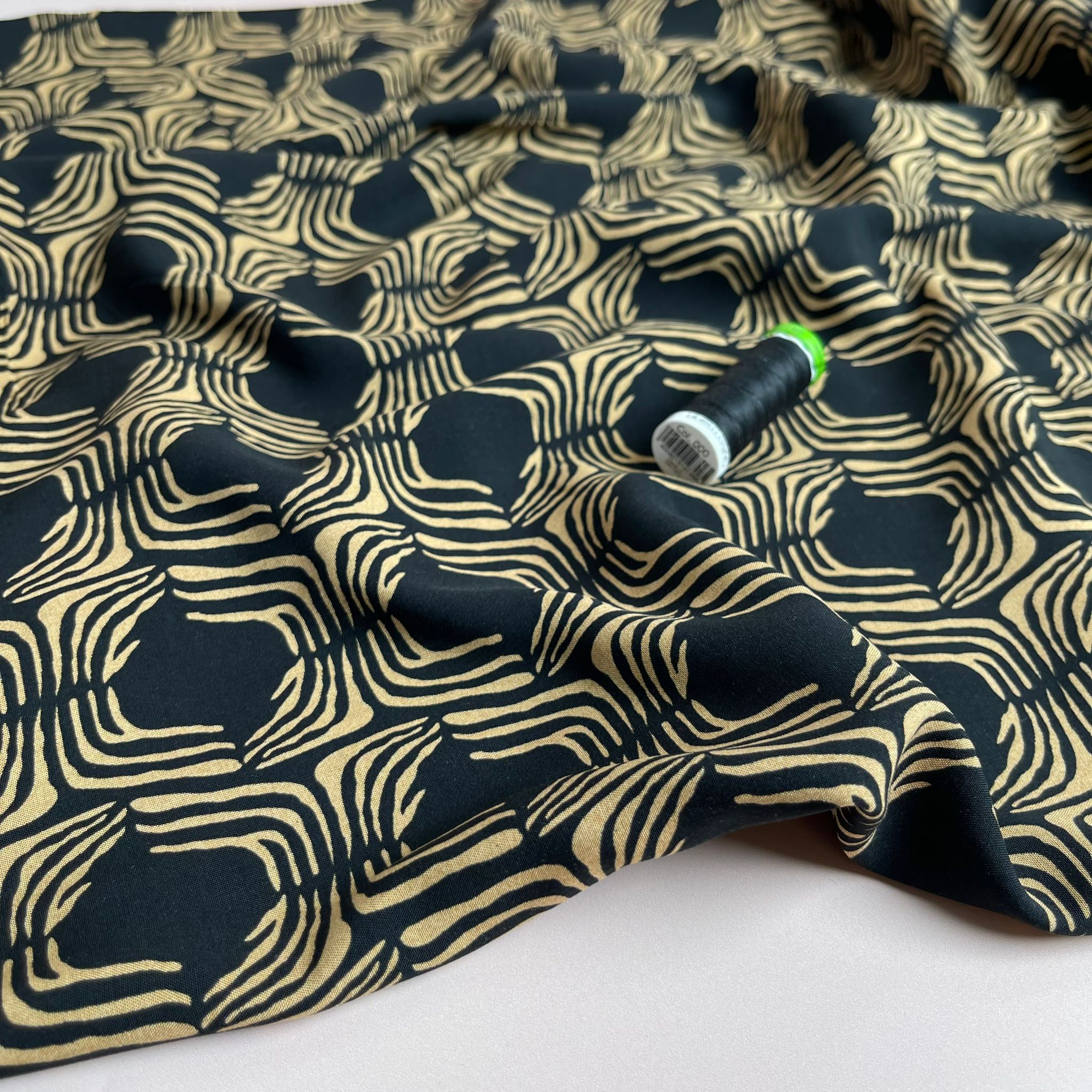 REMNANT 1.46 Metres - Abstract Lines in Gold on Black Viscose Poplin Fabric