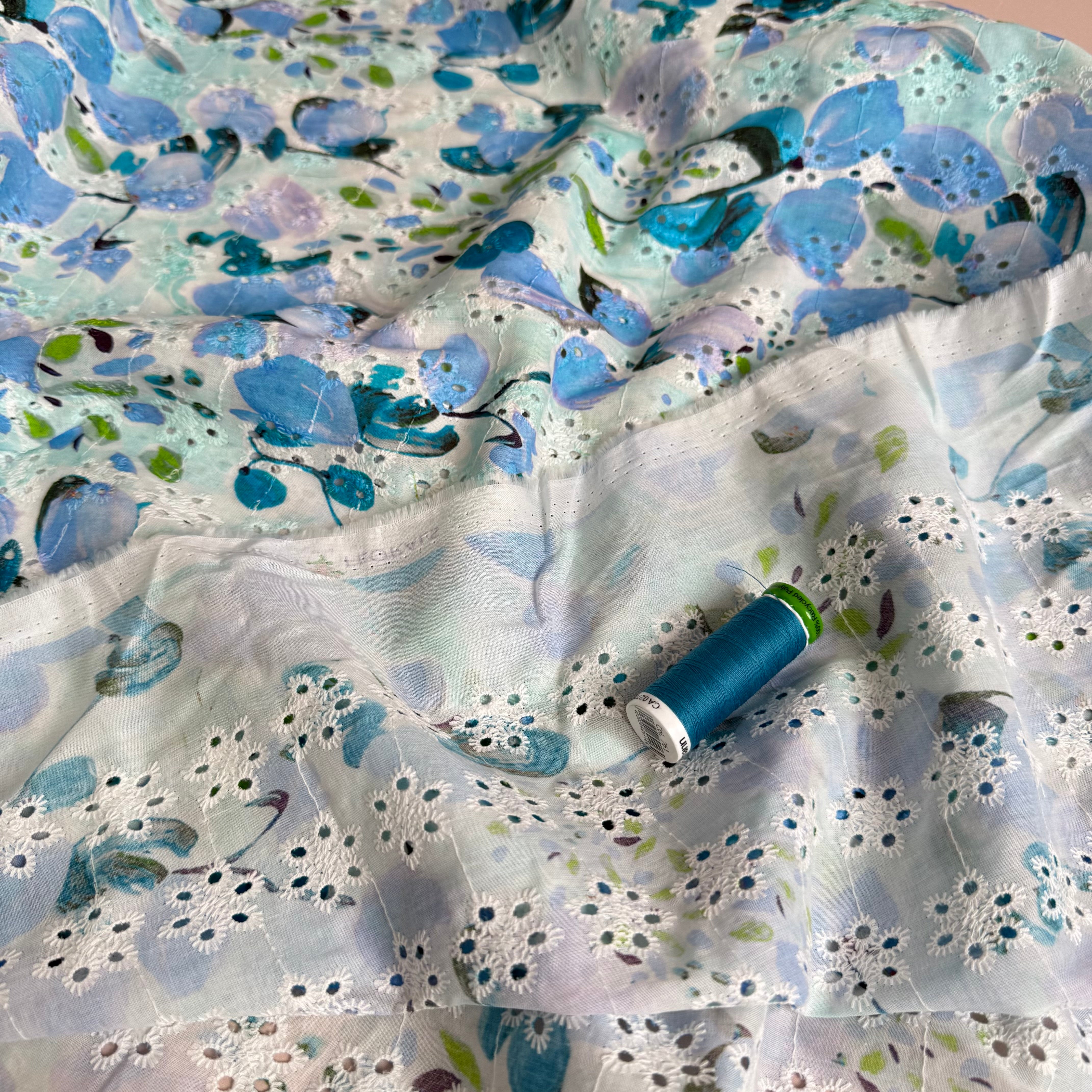 Blue Flowers on Embroidered White Cotton Voile Fabric