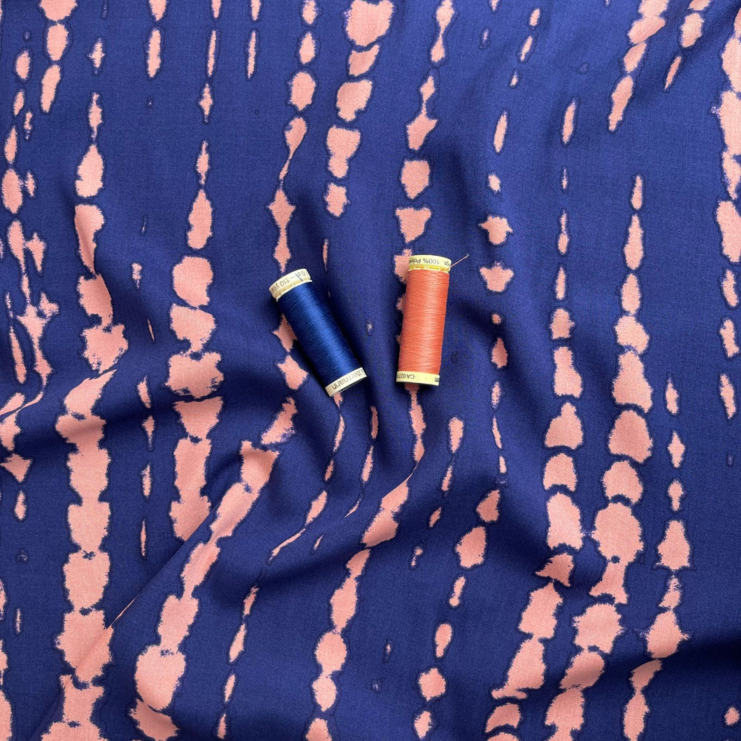 Broken Lines in Peach on Navy Viscose Fabric