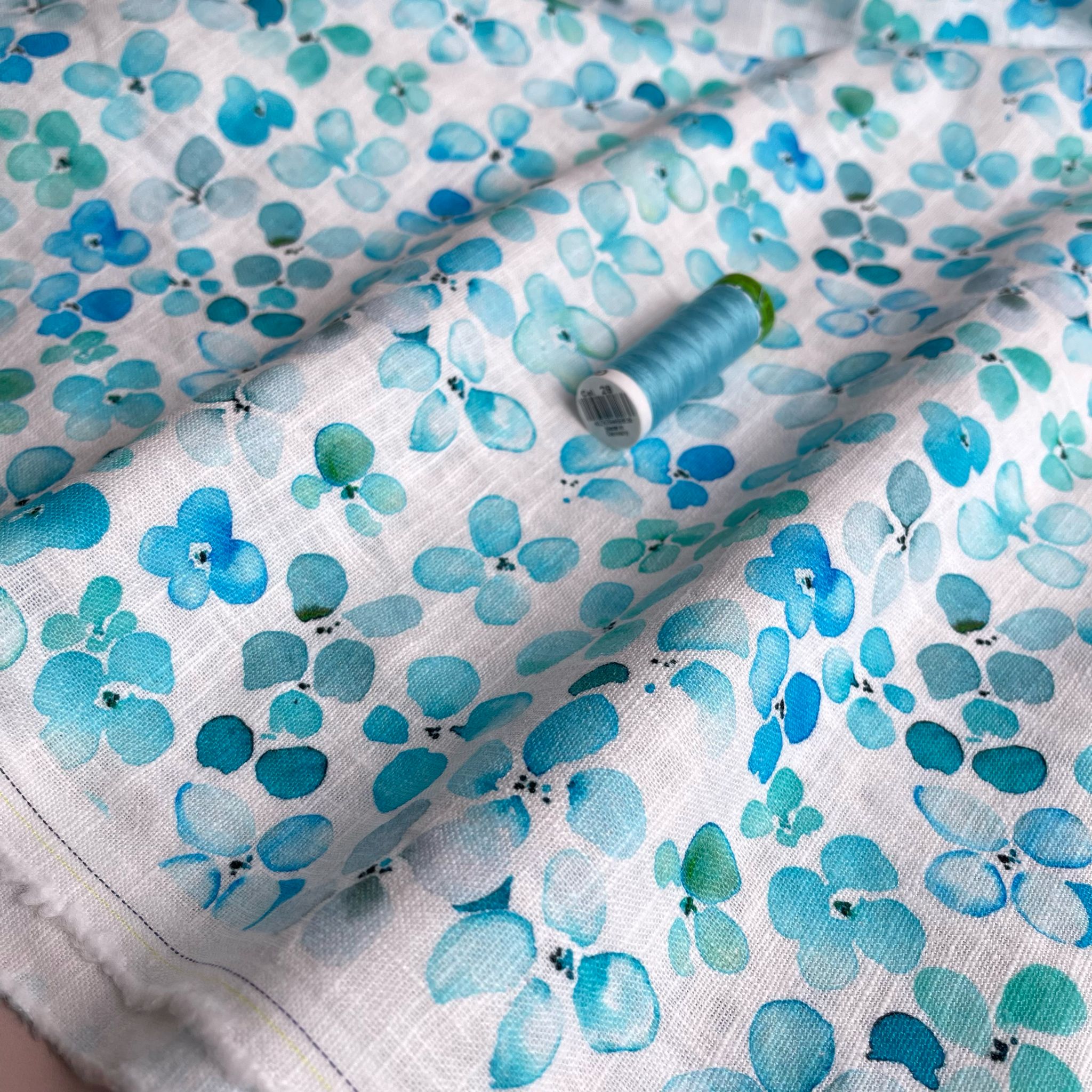 Turquoise Spring Petals on Pure Washed Linen Fabric