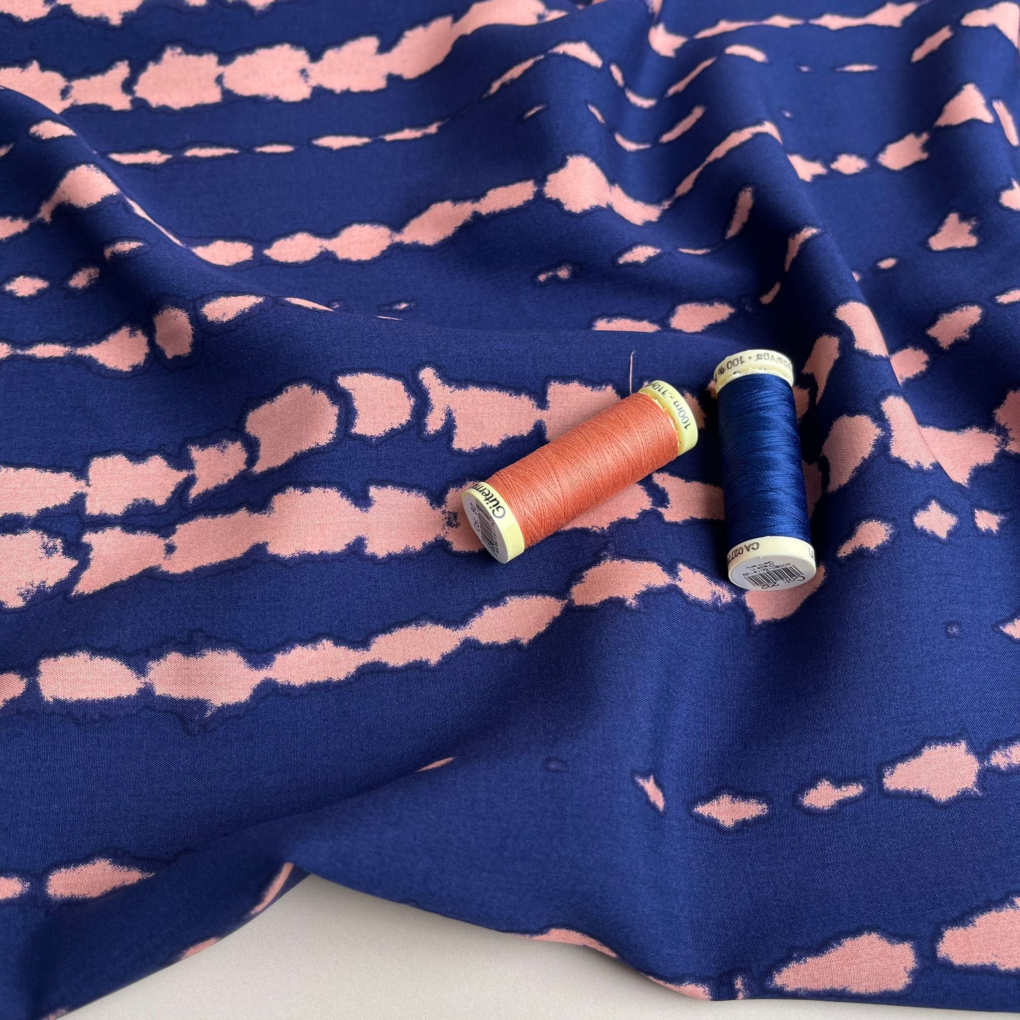 Broken Lines in Peach on Navy Viscose Fabric