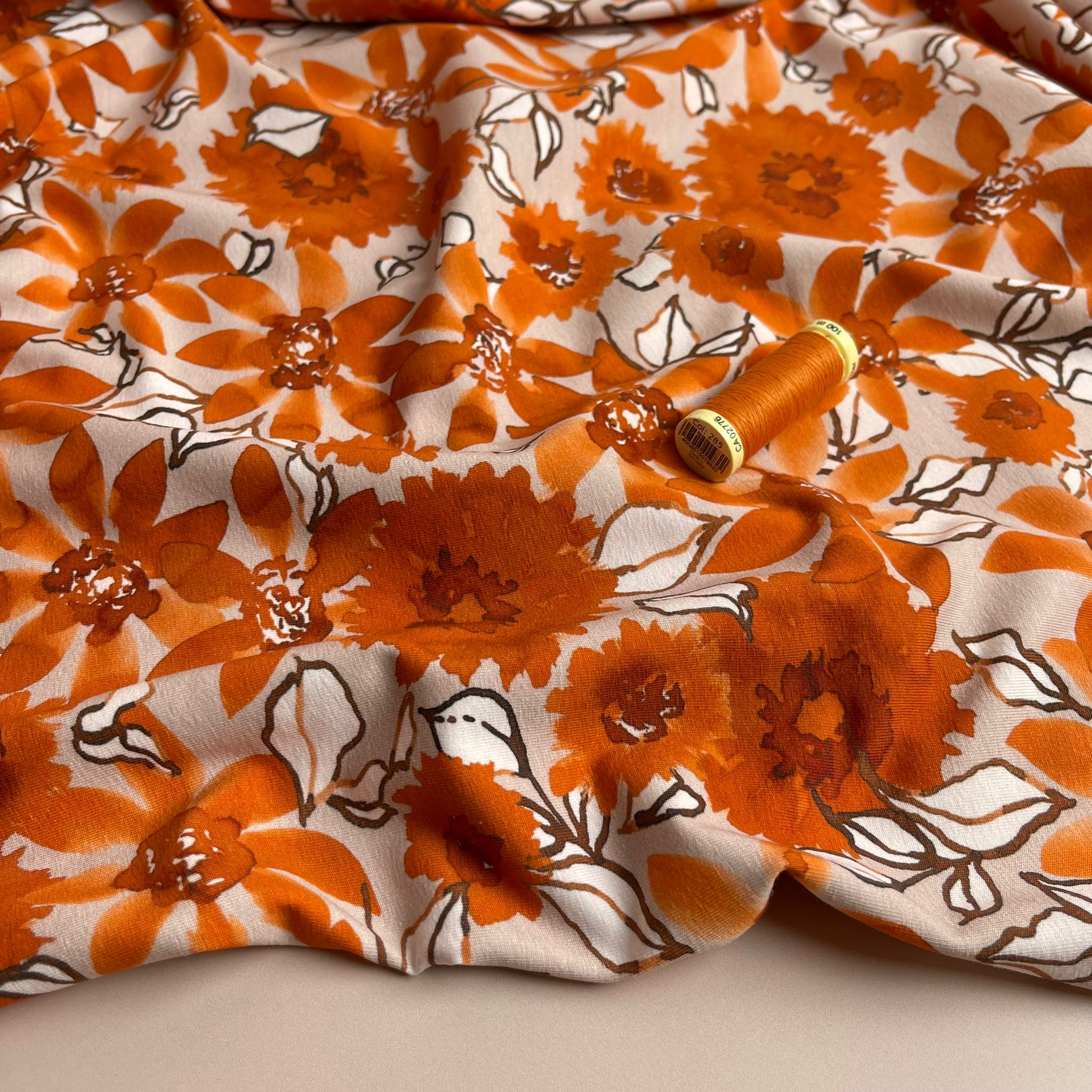 Danish Design - Rust Flowers on Pale Rose Cotton Jersey Fabric