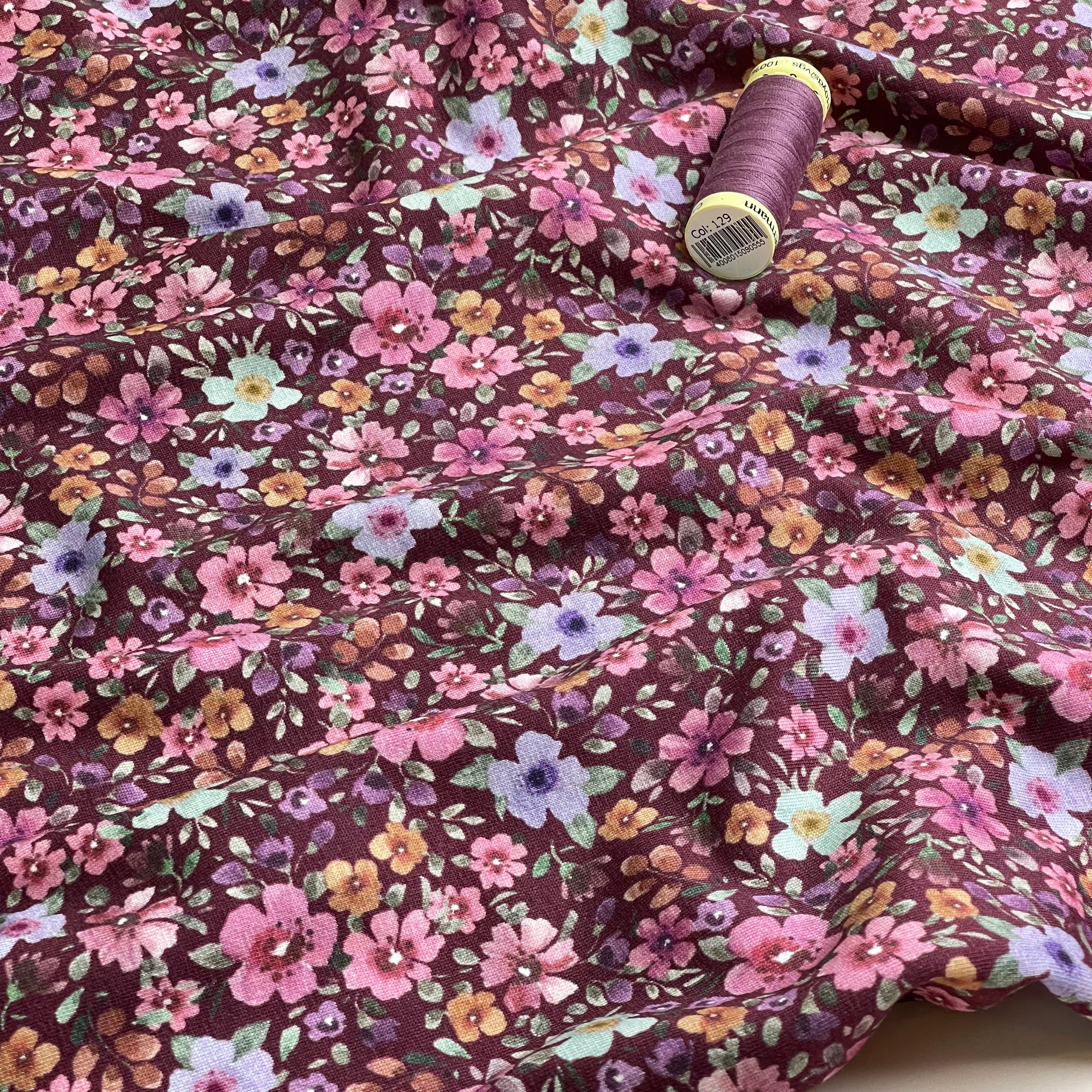 Ditsy Autumn Flowers on Burgundy Cotton Jersey Fabric