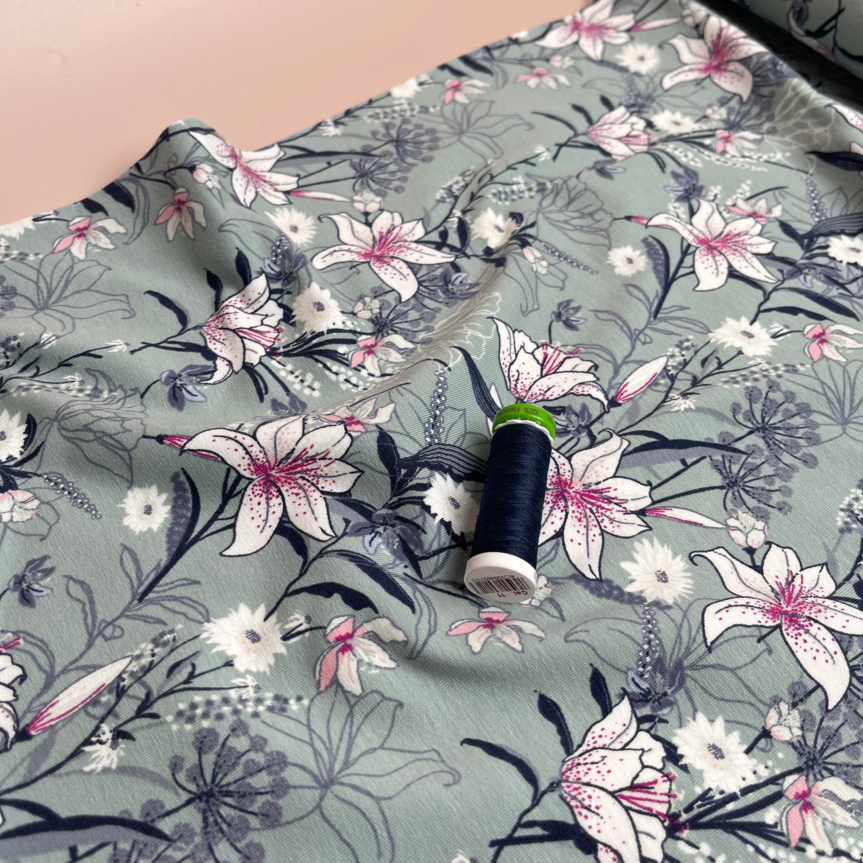 Lilies on Sage Green Cotton Jersey Fabric