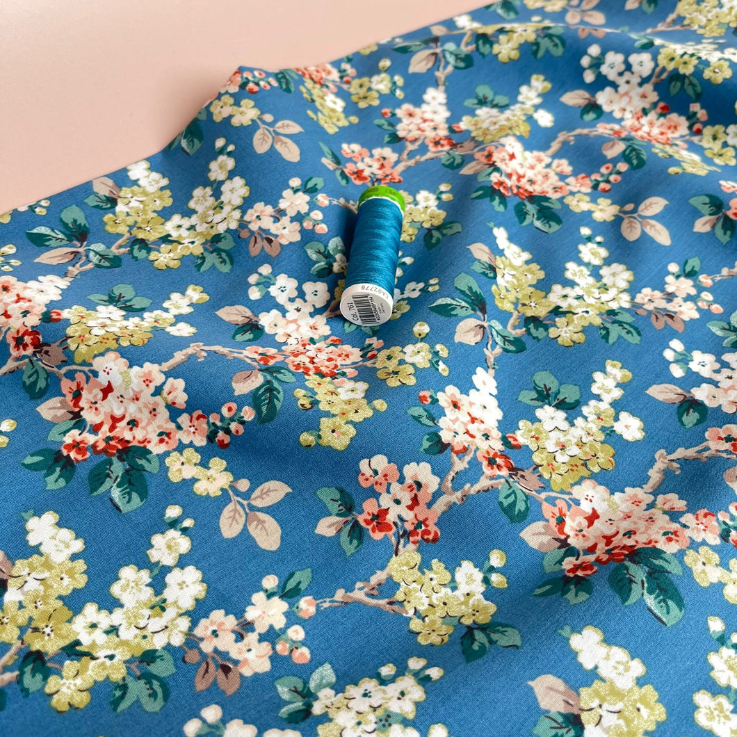 Spring Blossoms on Blue Cotton Poplin