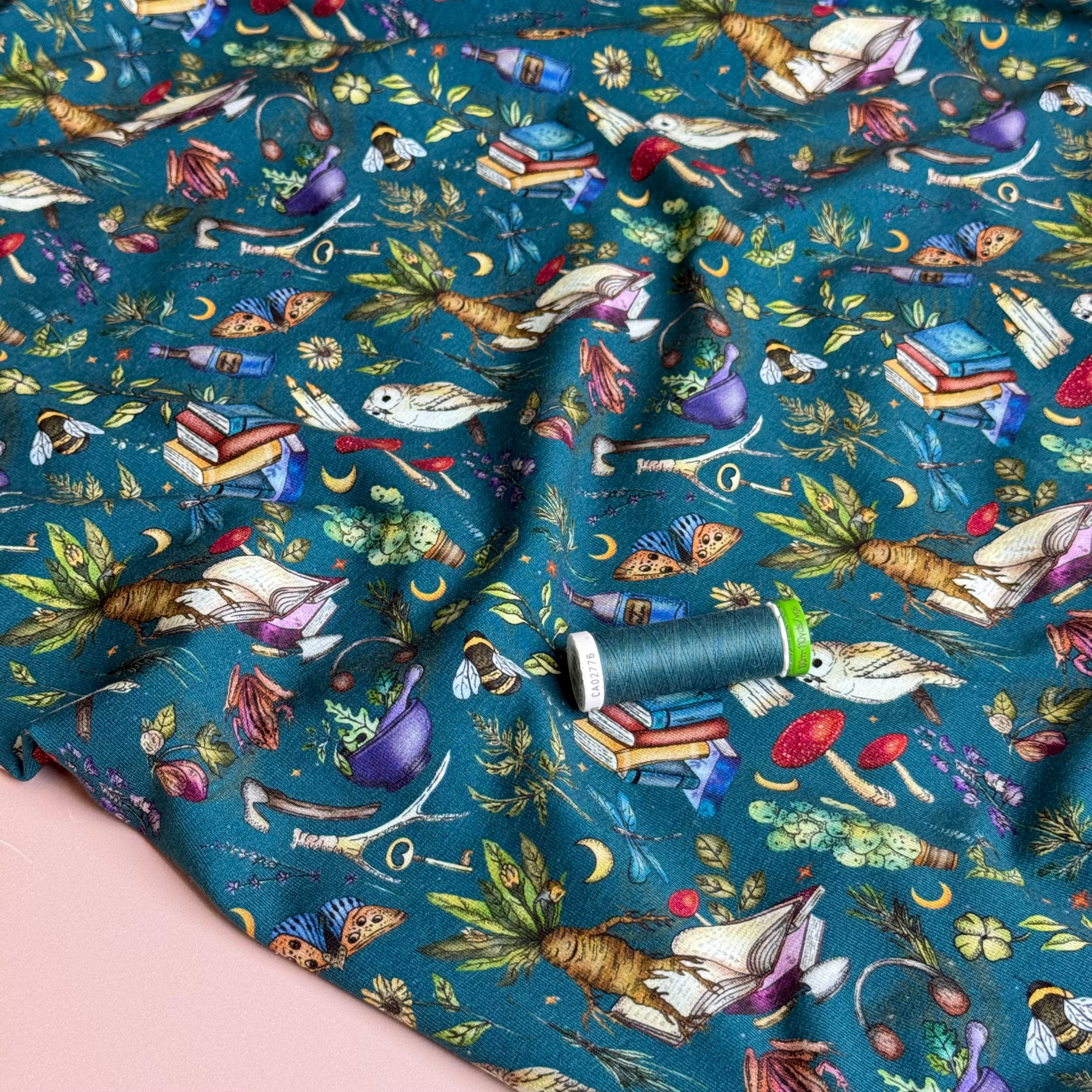 Magical Symbols Teal Cotton Jersey Fabric