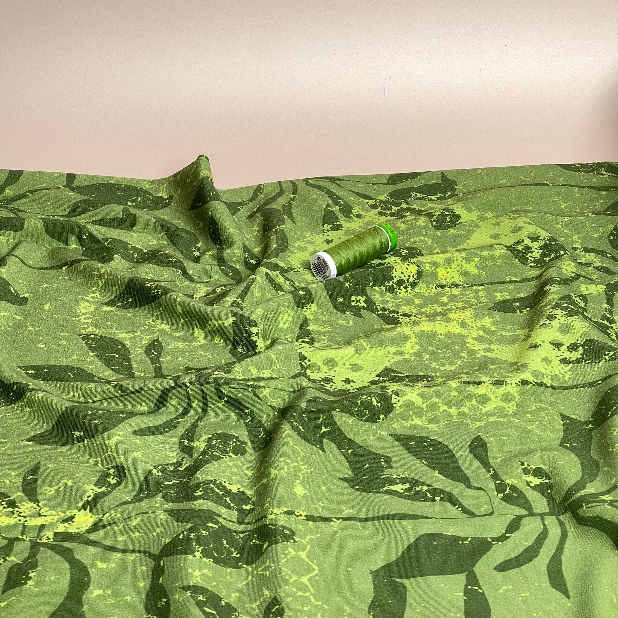 Danish Design - Foliage Shadows on Green Cotton Jersey Fabric