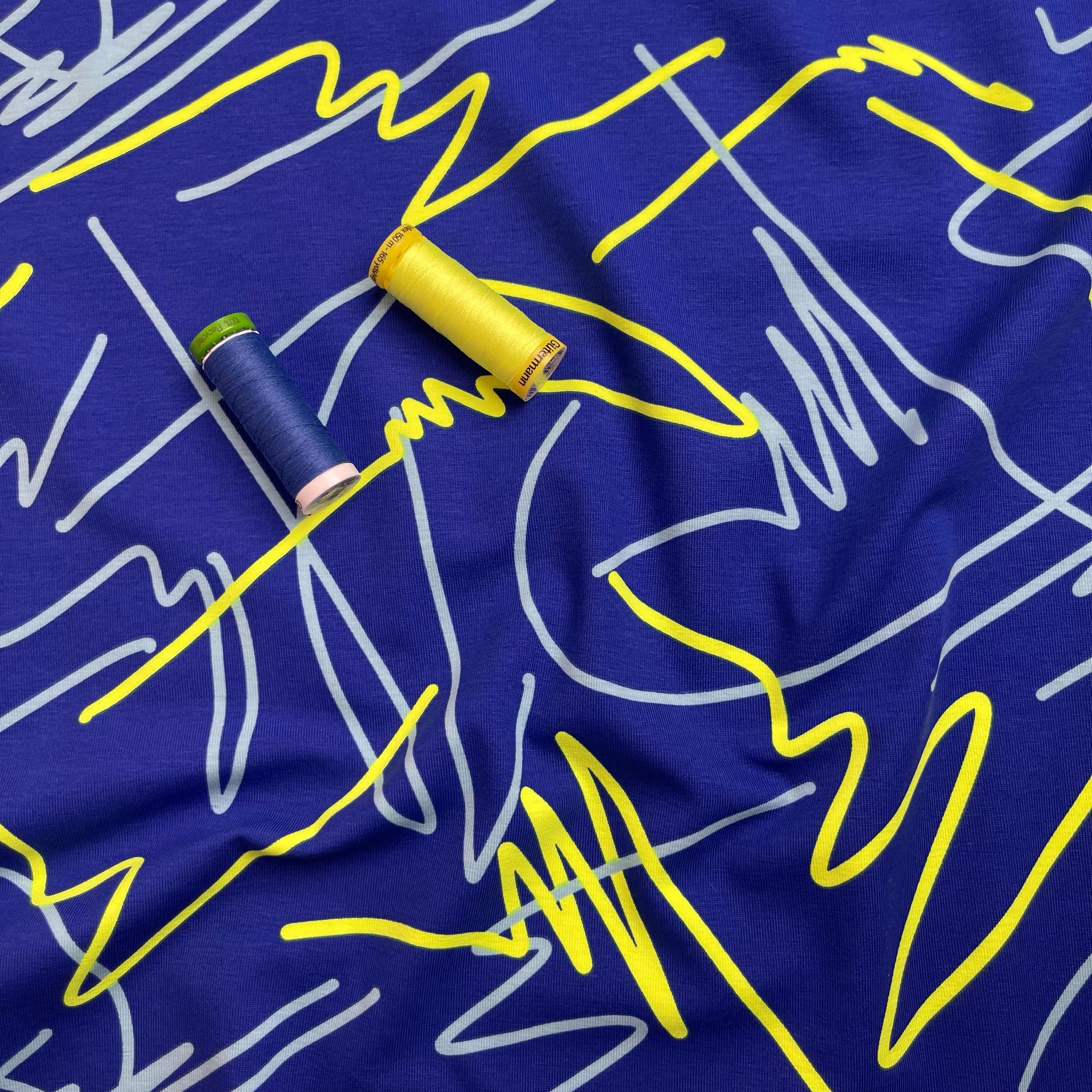 REMNANT 0.4 Metre - Neon Doodles on Blue Cotton Jersey Fabric