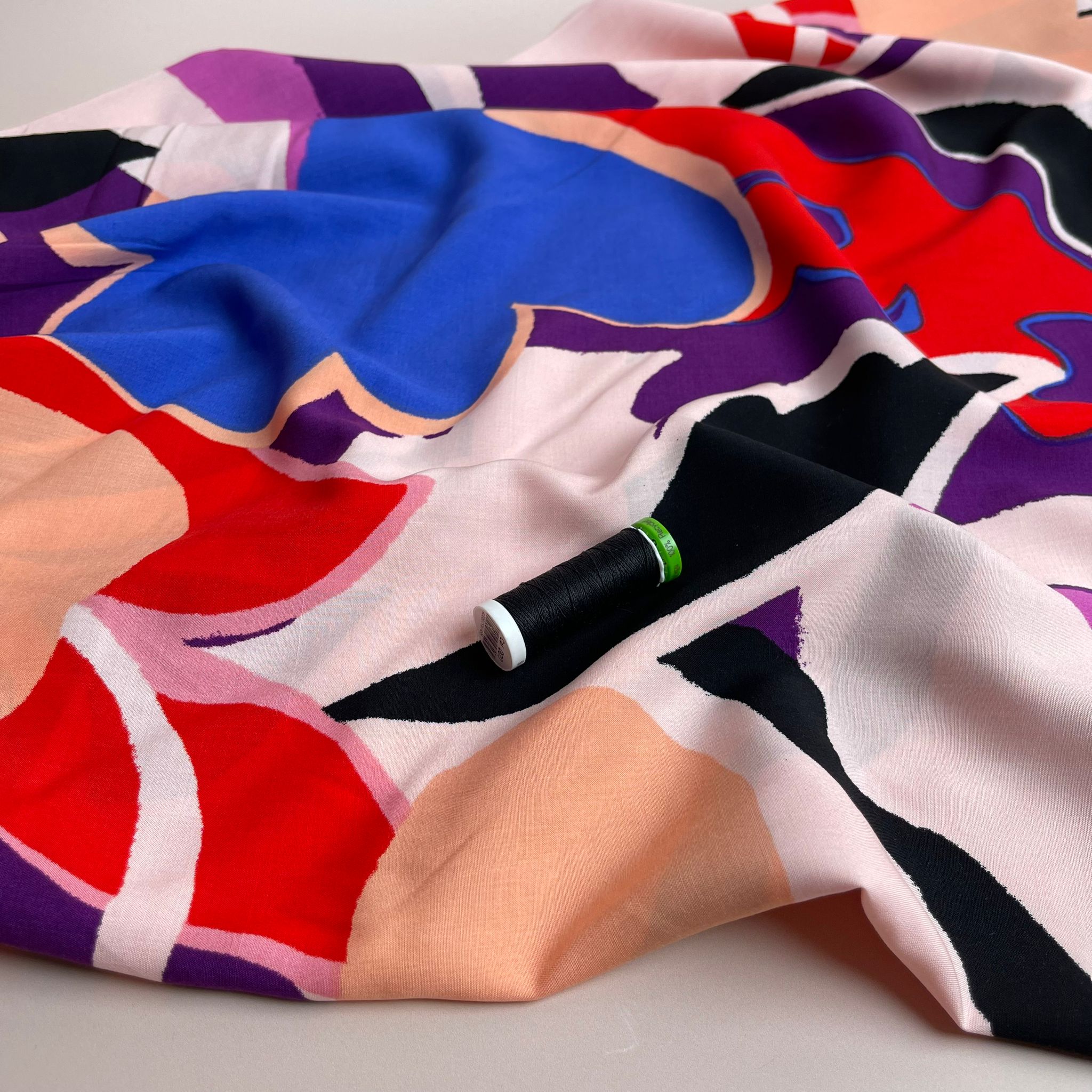 Bold Abstract Blooms on Purple Viscose Fabric