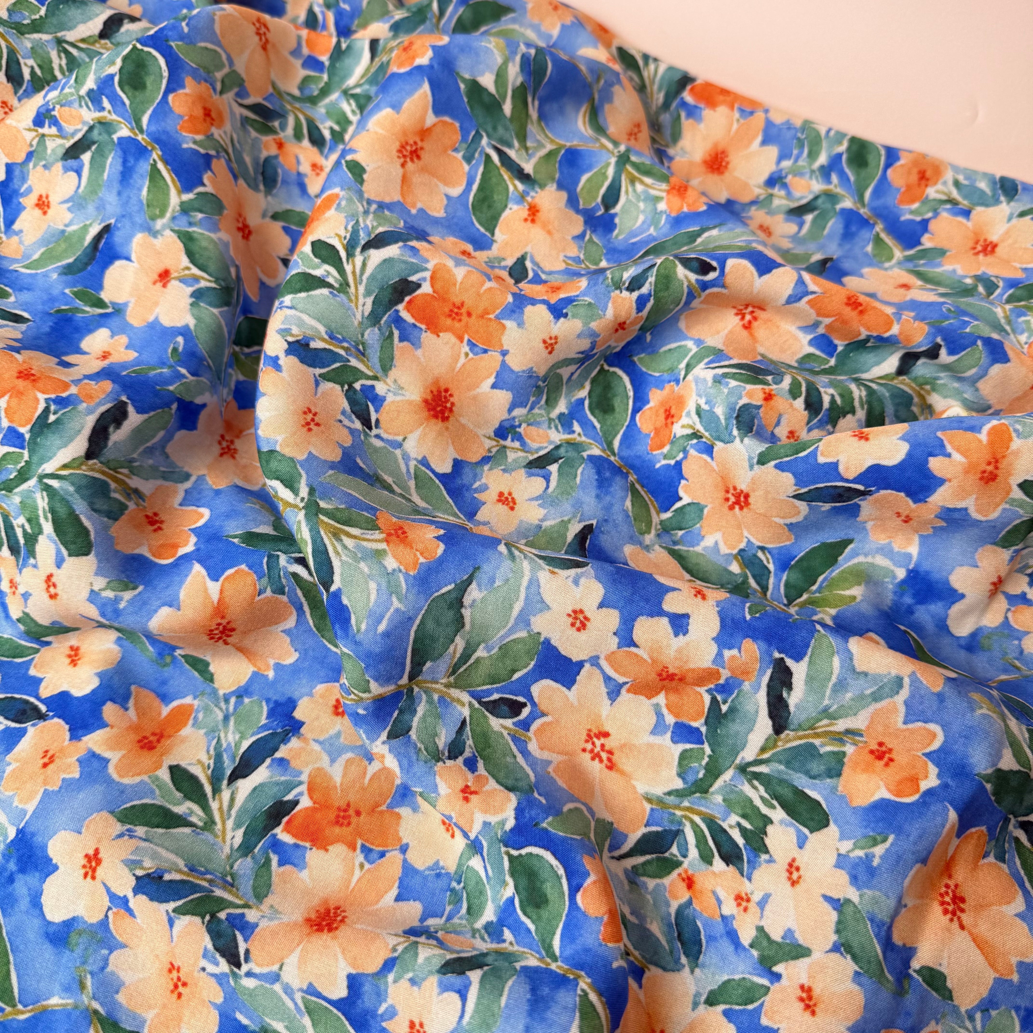 Peach Watercolour Flowers on Blue Viscose Fabric