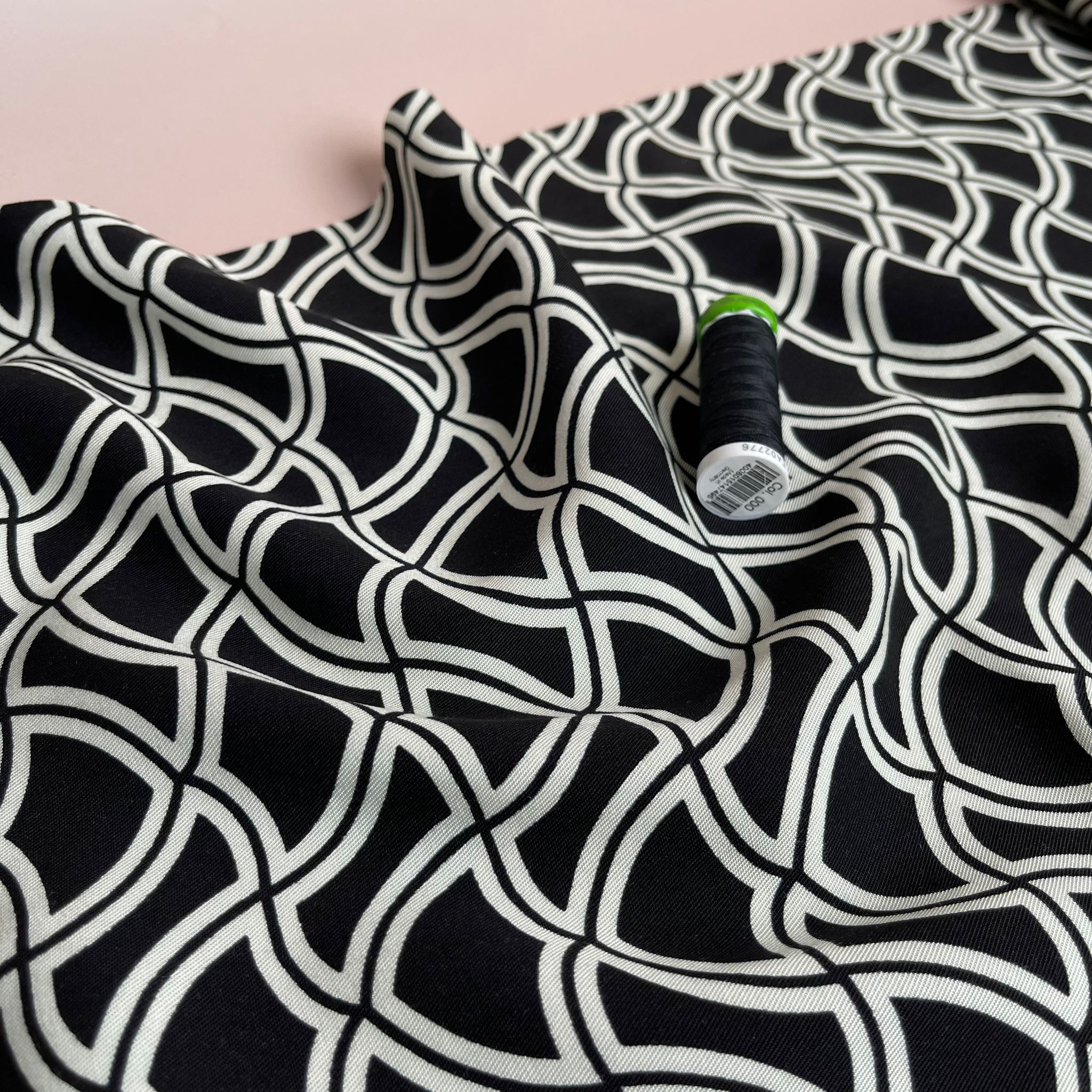 Abstract Waves on Black Viscose Twill Fabric