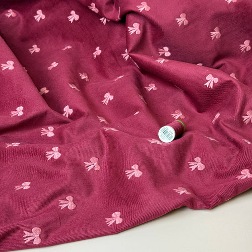 REMNANT 0.66 Metre (slight fault - pulled thread) - Embroidered Bows on Bordeaux Cotton Needlecord