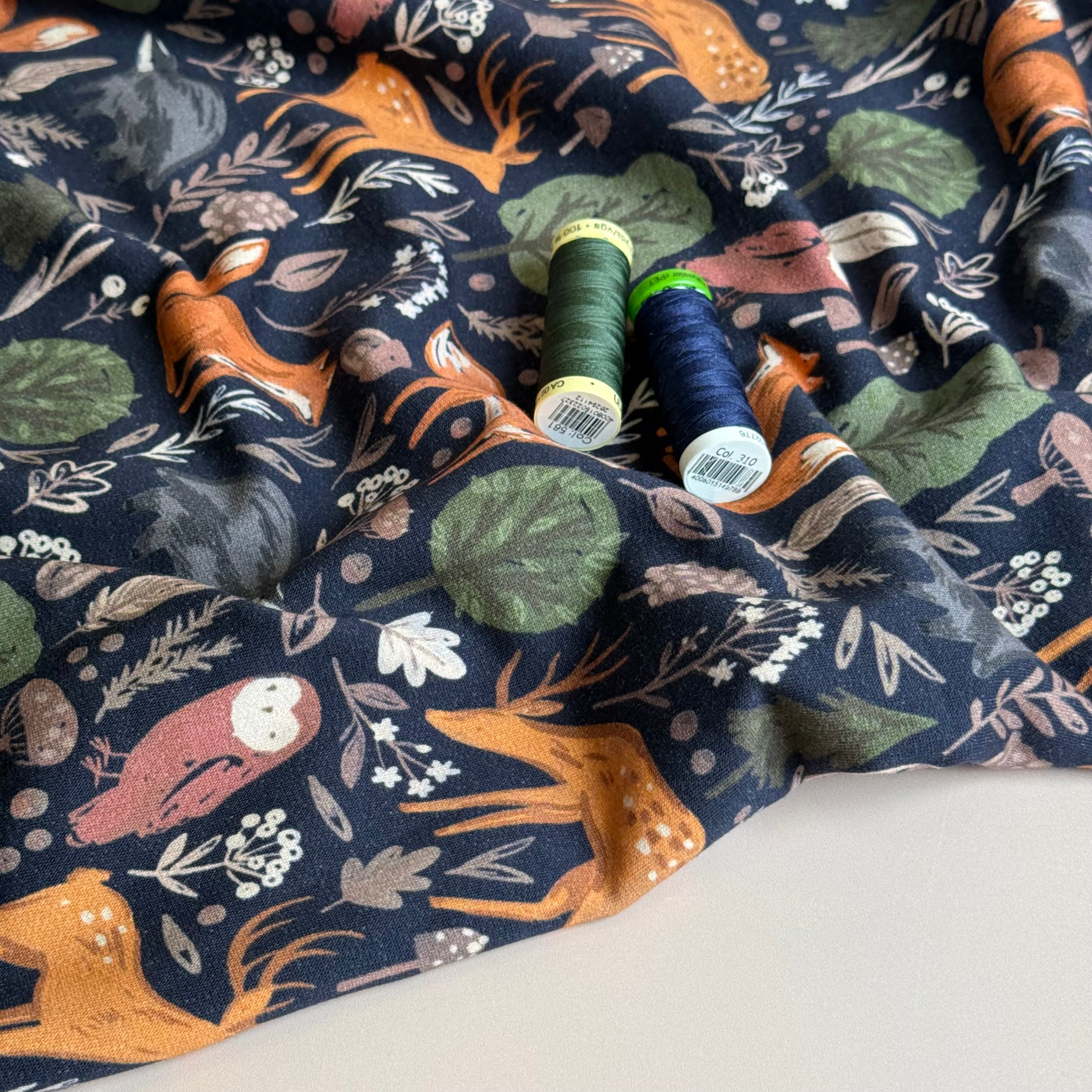Woodland Anmals on Dark Navy Cotton Sweat Shirting Fabric