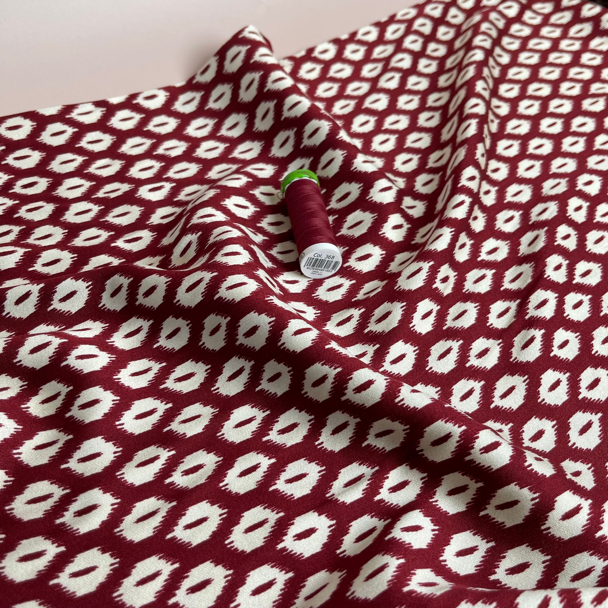 REMNANT 1.79 Metres (plus extra section with slight fading)  - Abstract Rhombus on Burgundy Viscose Twill Sateen Fabric