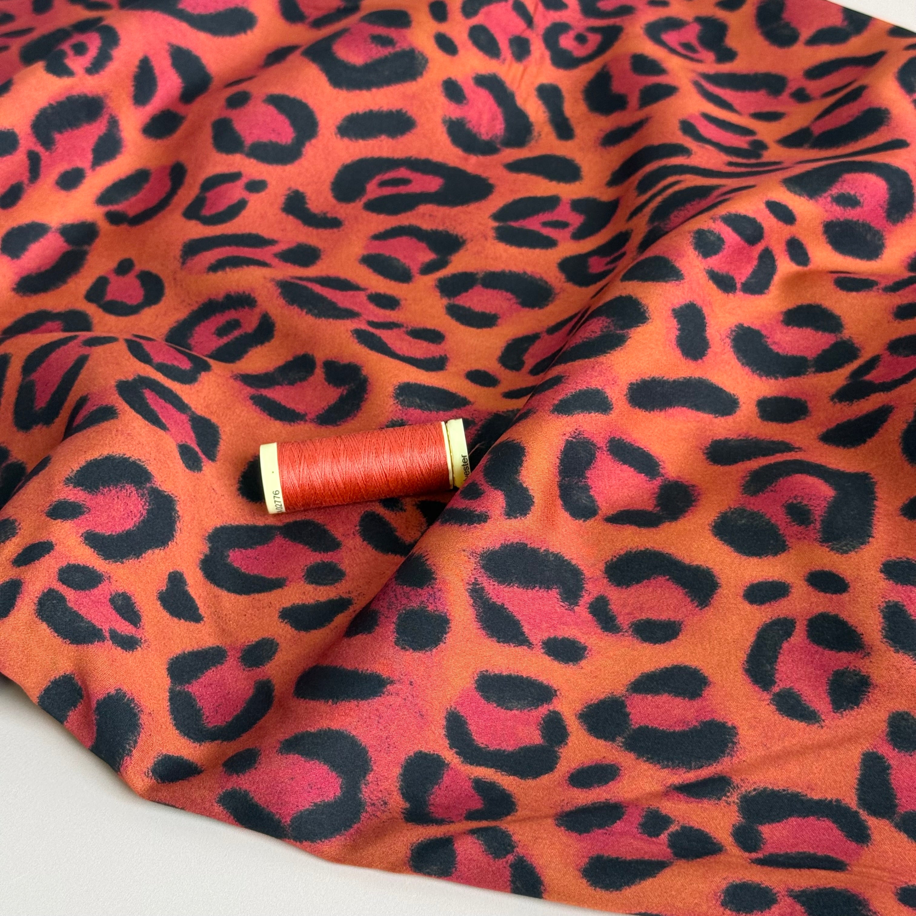 Animal Print Orange Viscose Sateen Fabric