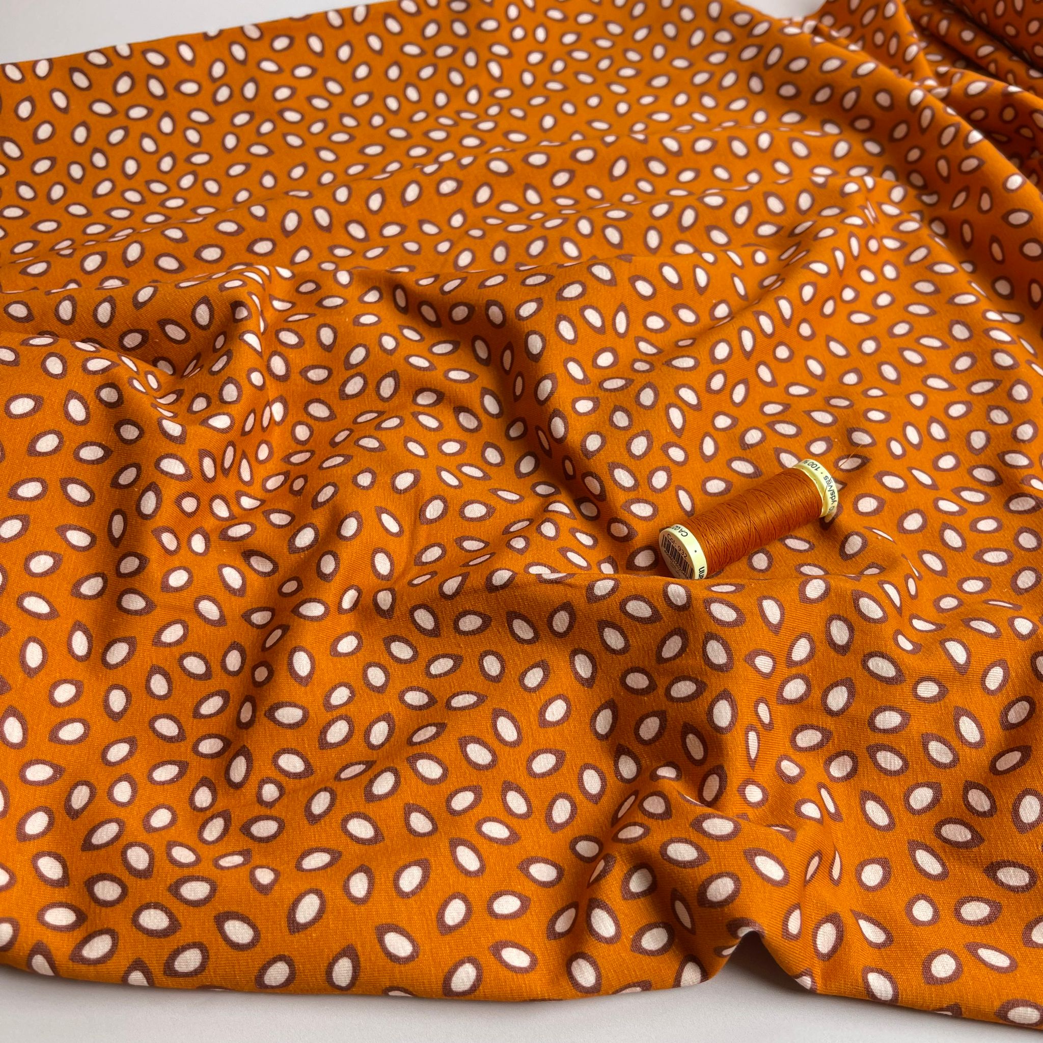 Danish Design - Small Petals on Rust Cotton Jersey Fabric