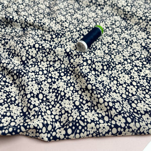 Off-White Floral Field on Dark Navy Viscose Fabric