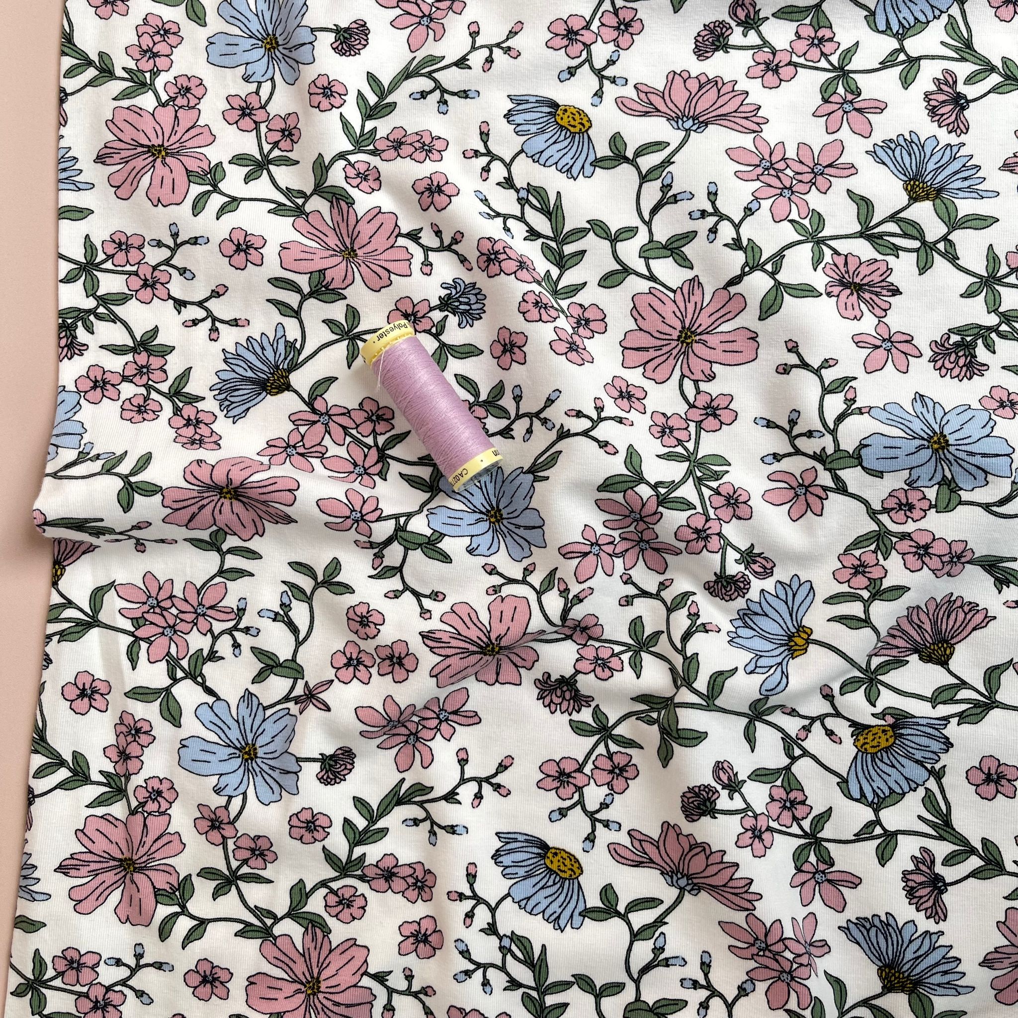 Pink Flowers on White Cotton Jersey Fabric