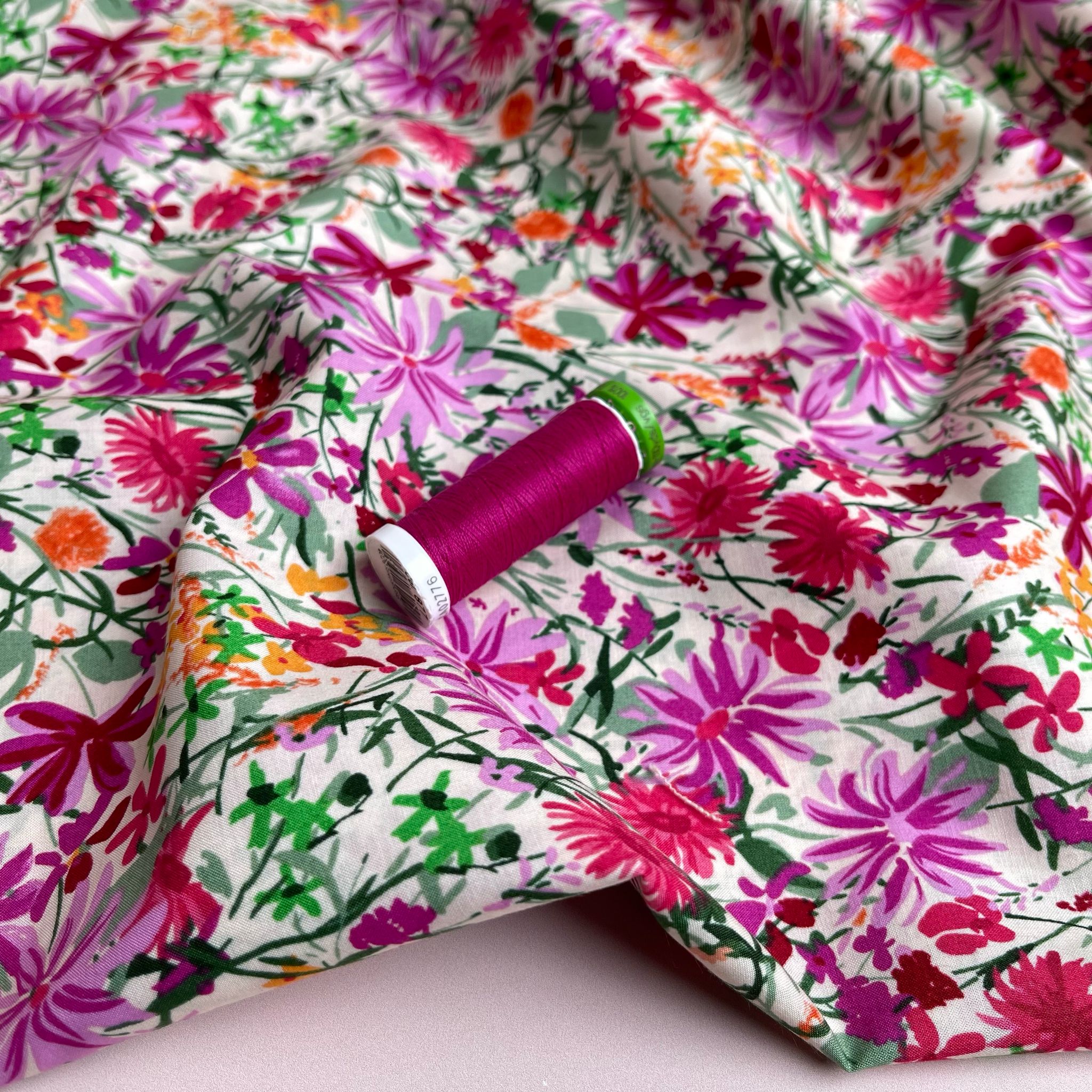 Magenta Meadow on White Cotton Lawn Fabric