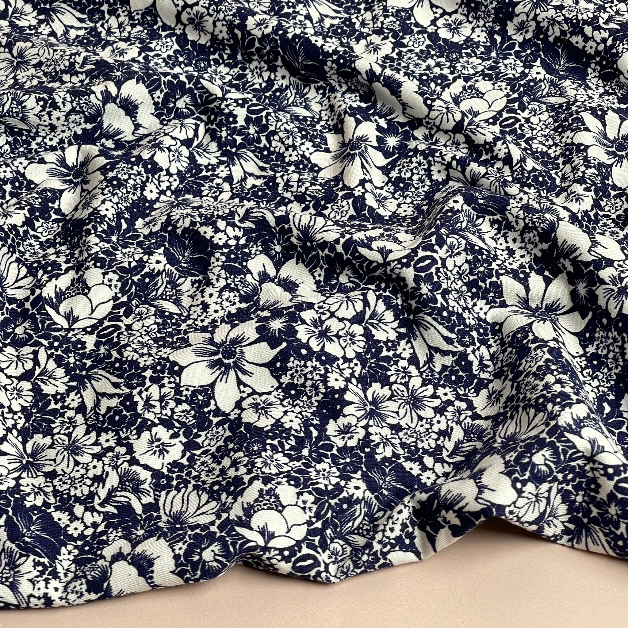 White Flowers on Navy Viscose Jersey Fabric