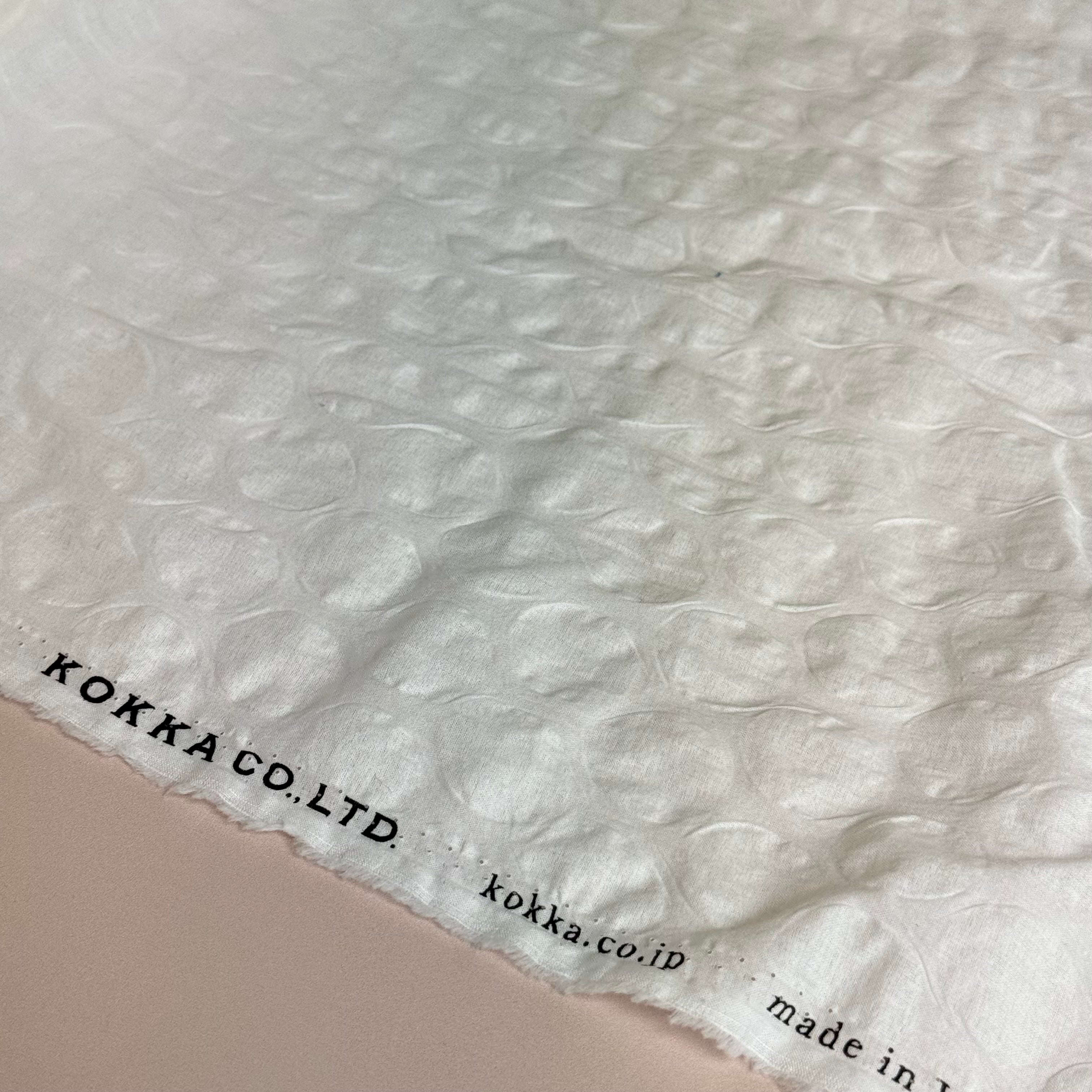 Kokka - Textured Circles Ripple Cotton Lawn in Off-White
