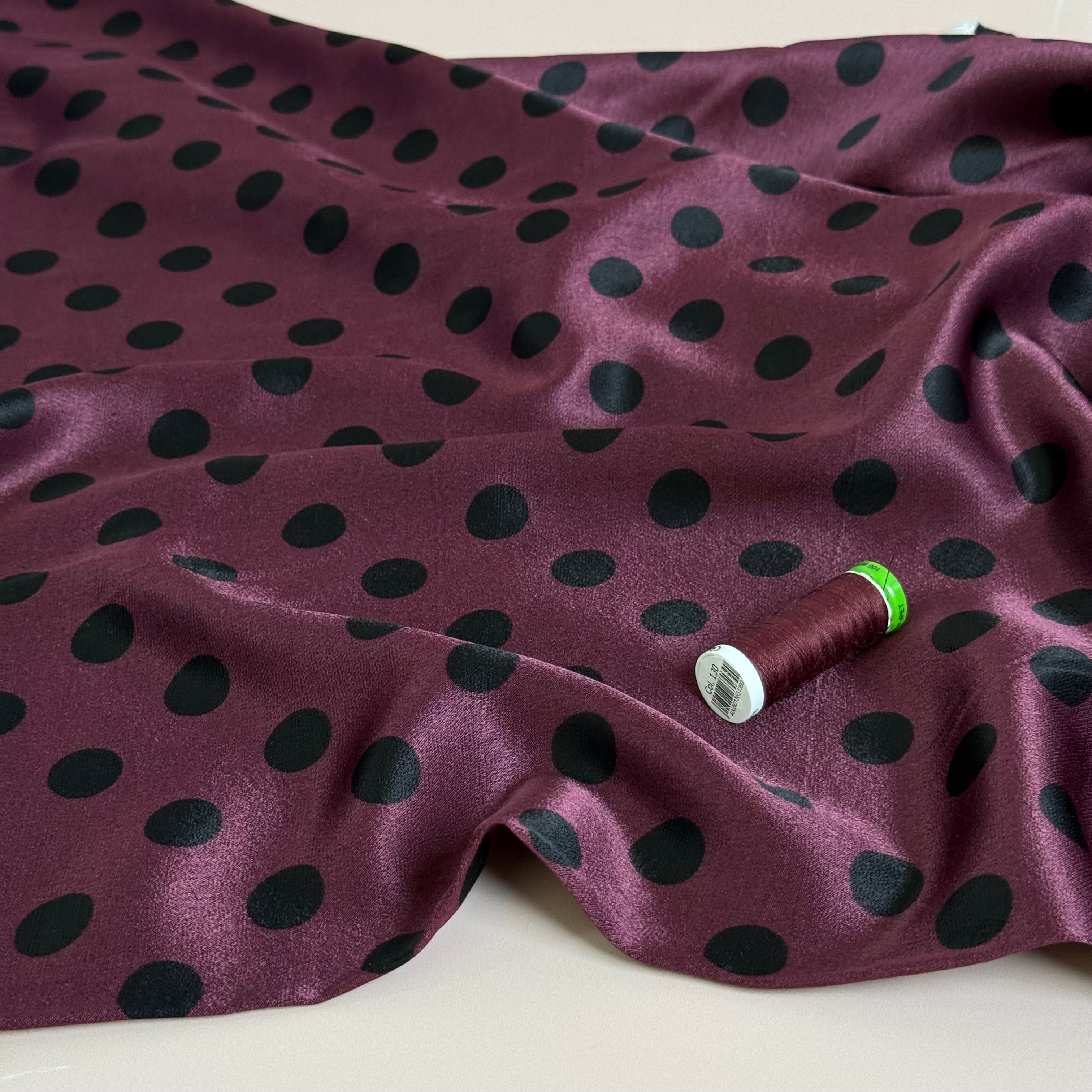Polka Black on Wine Spun Viscose Sateen Fabric