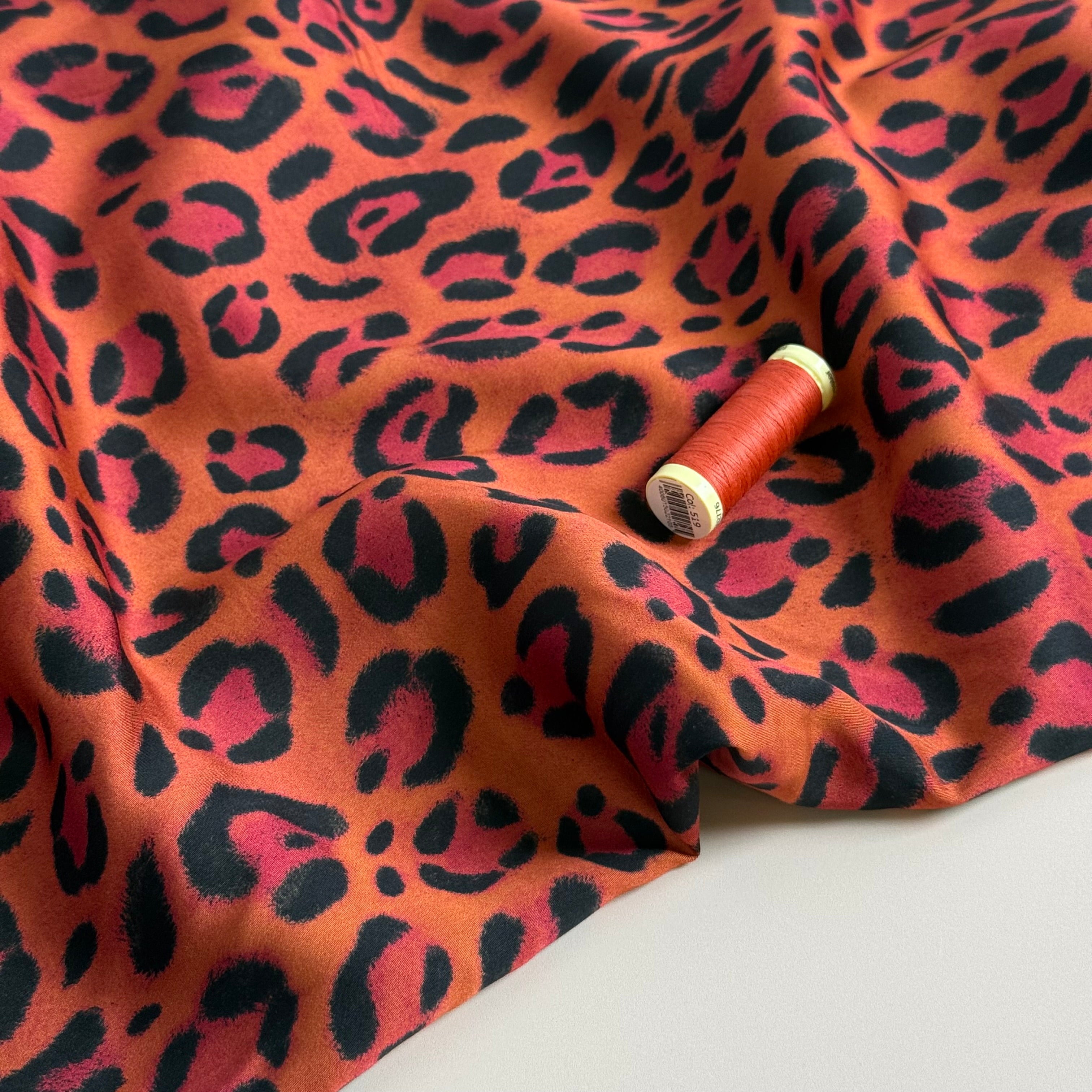 Animal Print Orange Viscose Sateen Fabric