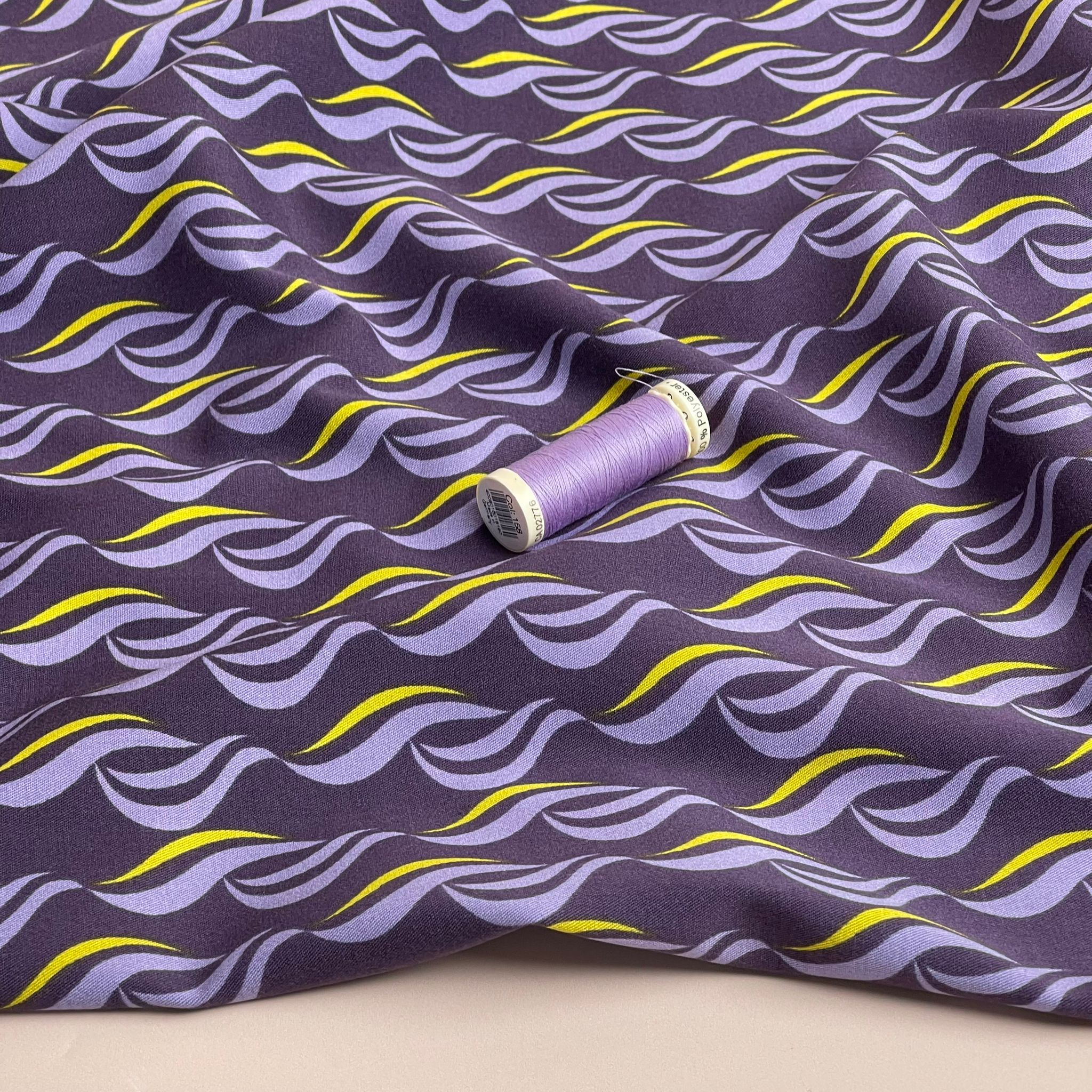 Rosella Waves on Purple Viscose Twill with Stretch