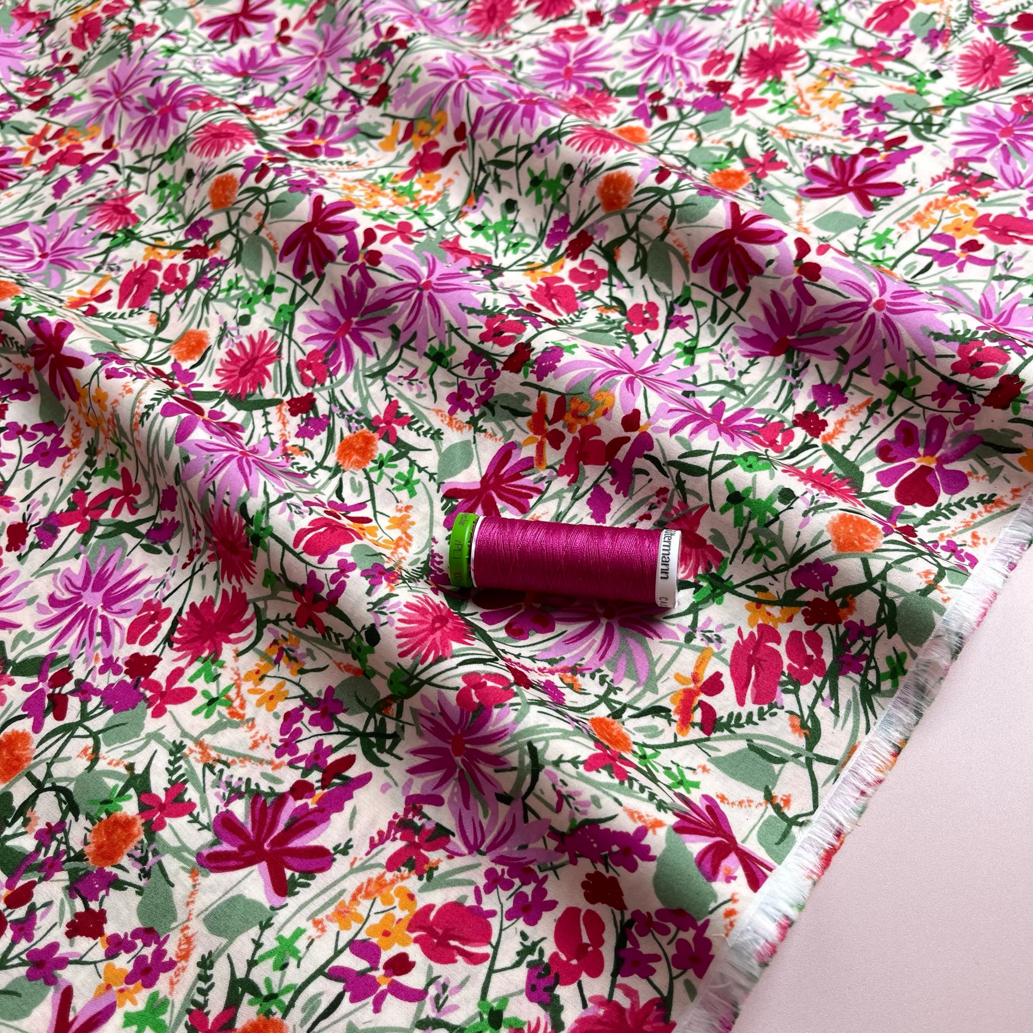 Magenta Meadow on White Cotton Lawn Fabric