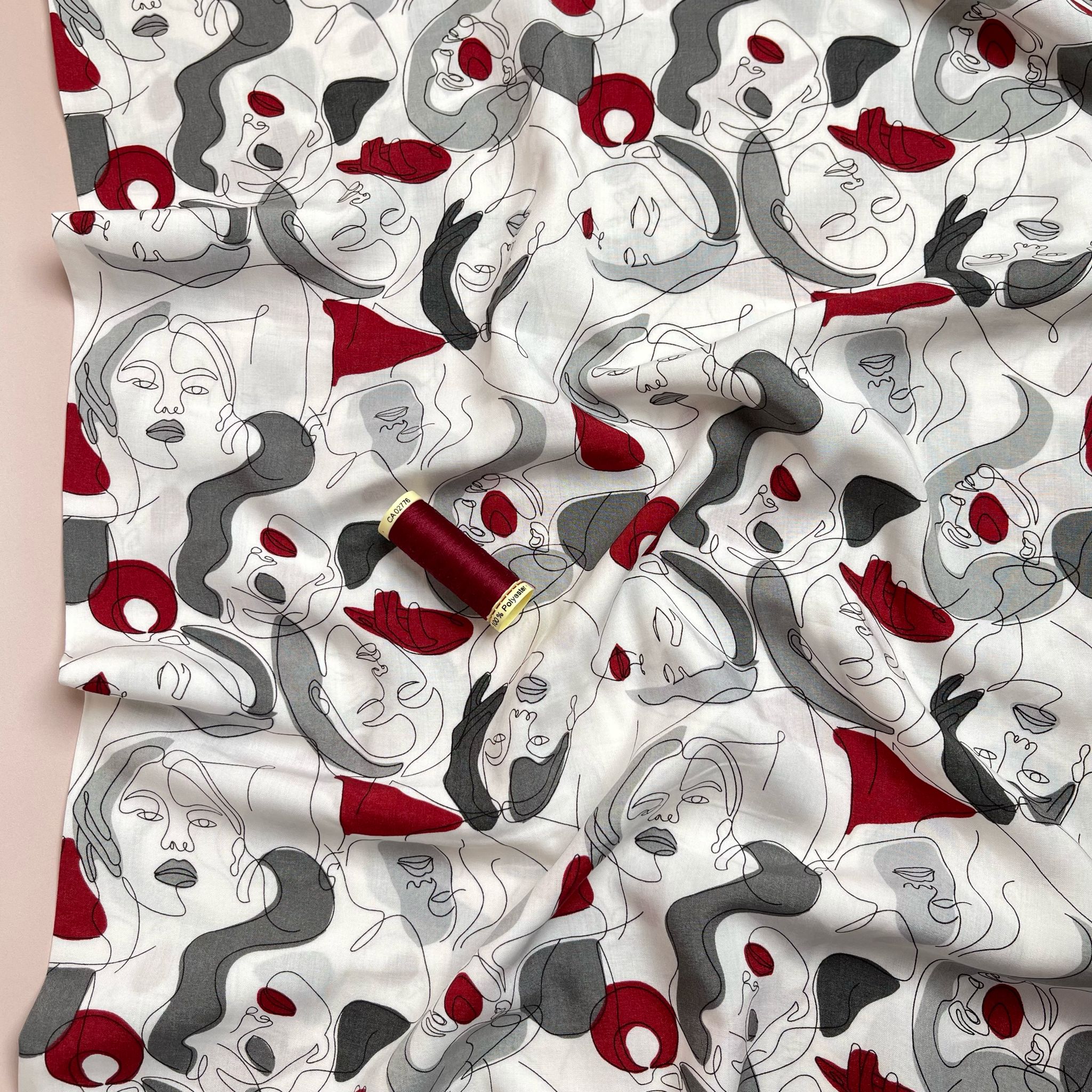 Faces on Grey Viscose Fabric
