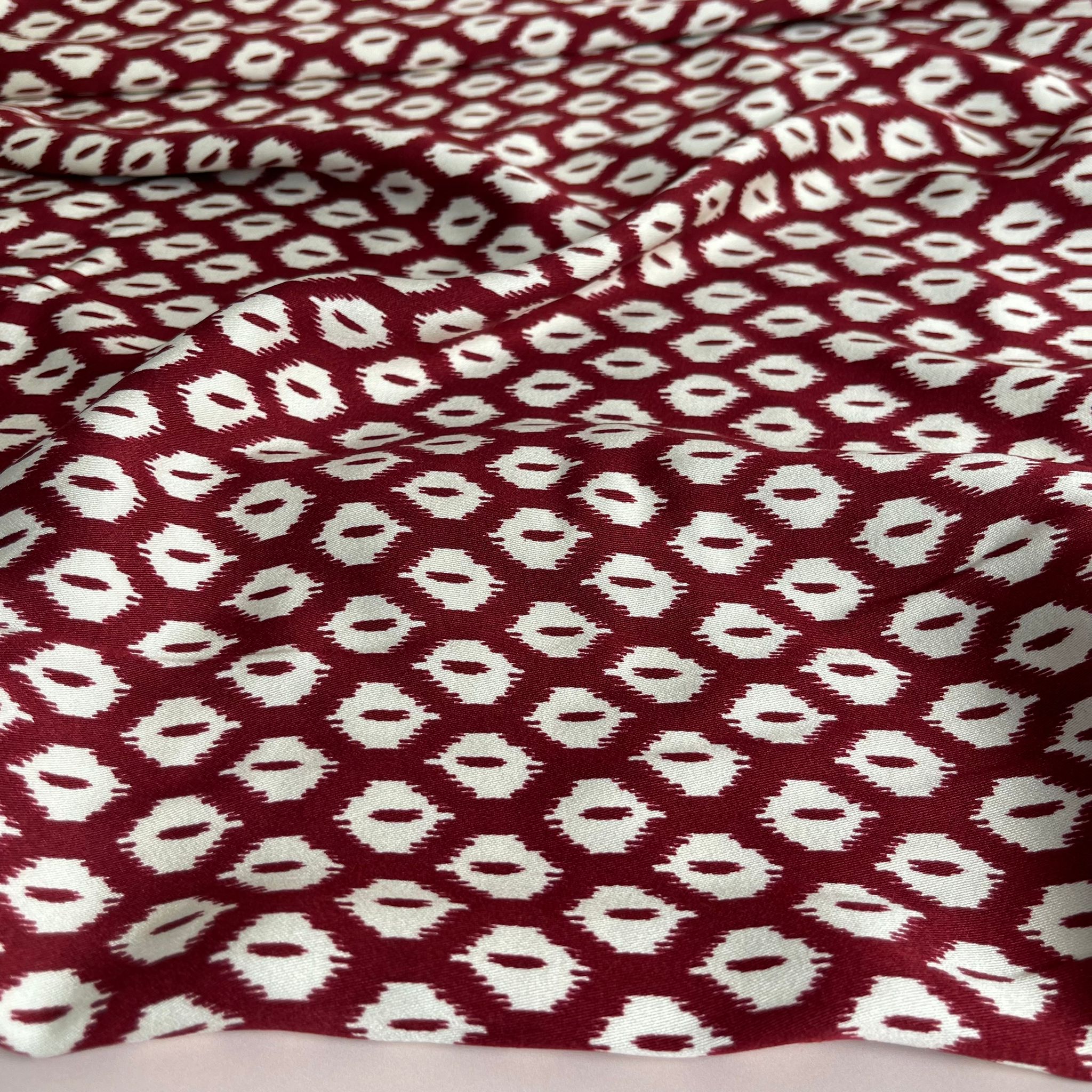 REMNANT 1.79 Metres (plus extra section with slight fading)  - Abstract Rhombus on Burgundy Viscose Twill Sateen Fabric