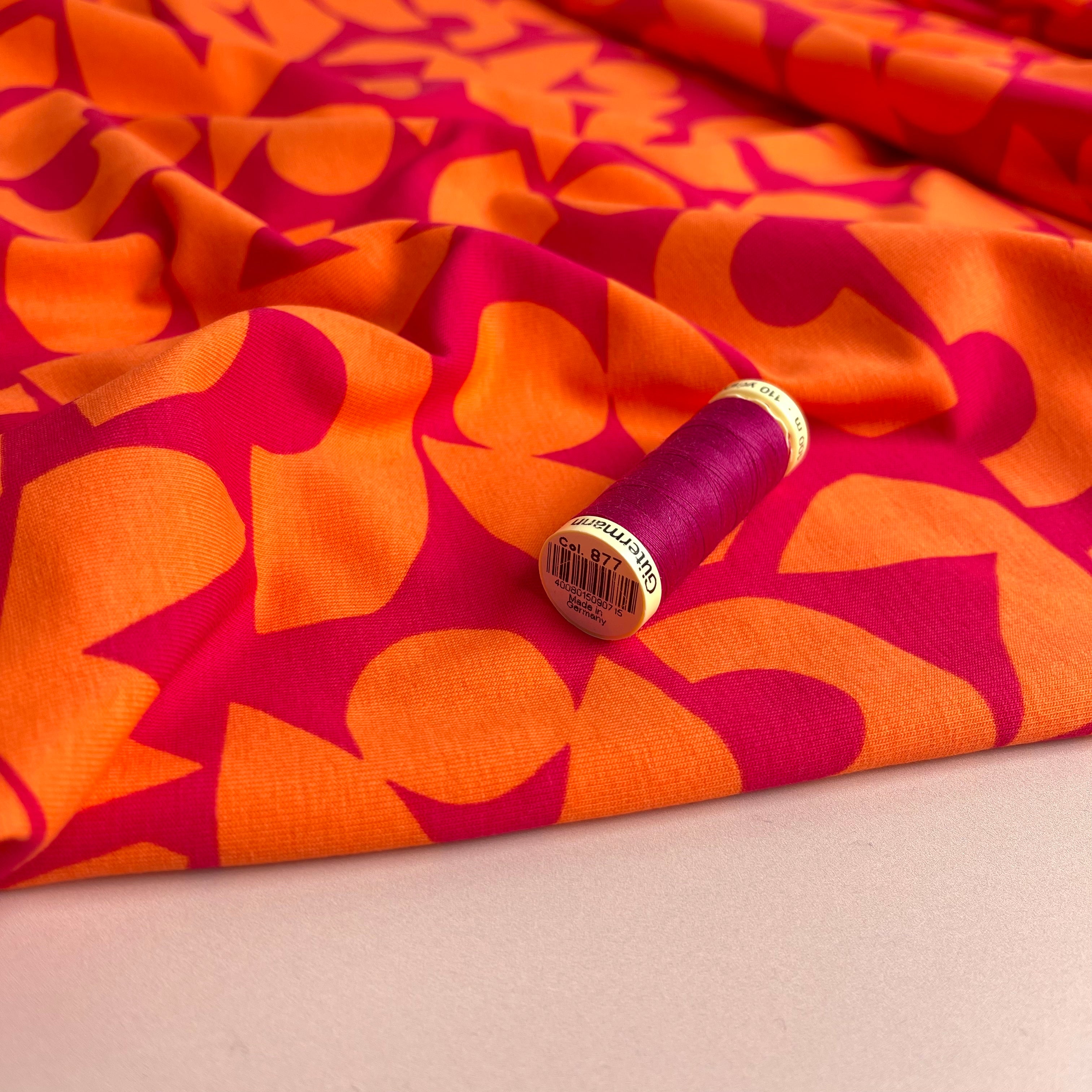 Orange Shapes on Cerise Combed Cotton Jersey Fabric