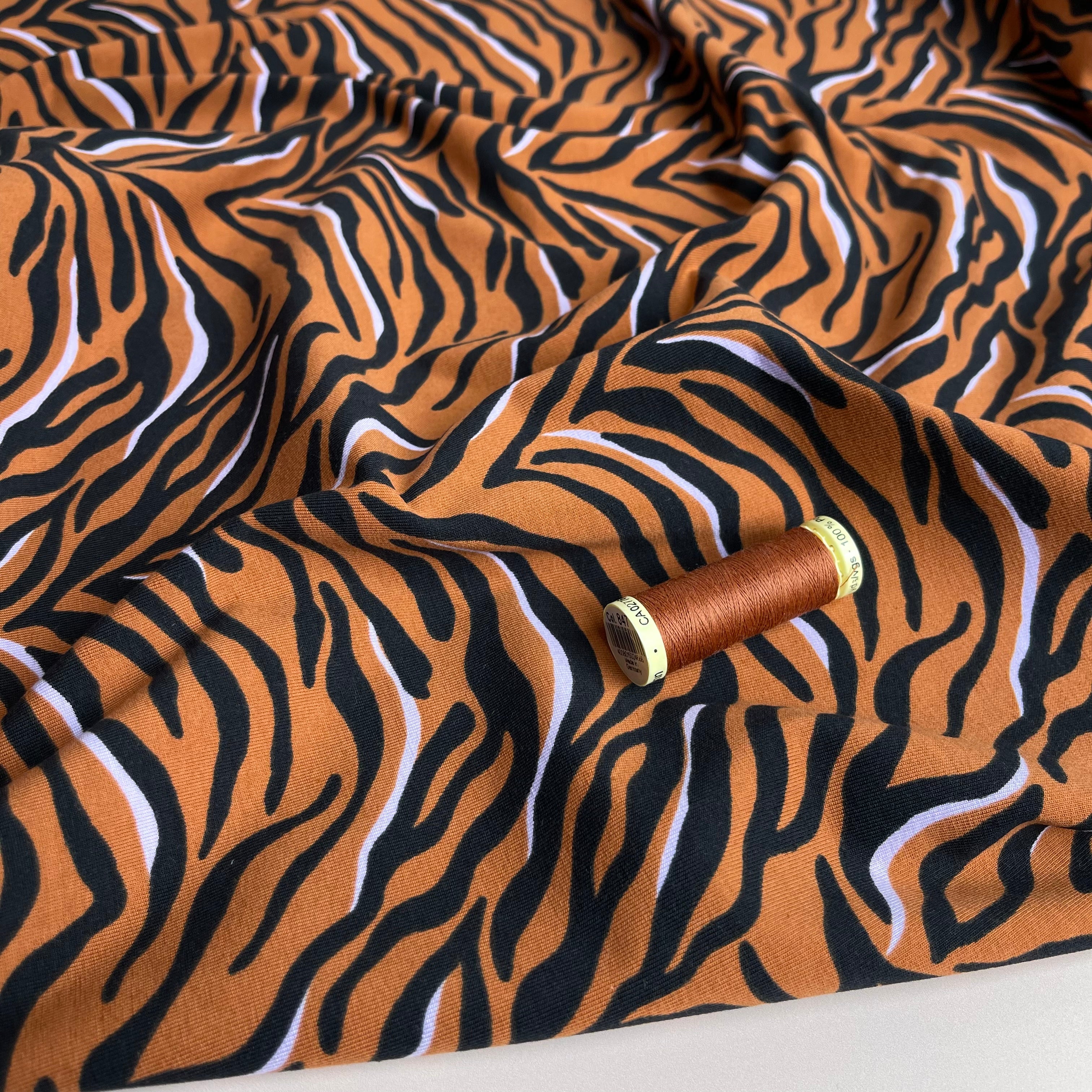 Zebra in Rust Cotton Jersey Fabric