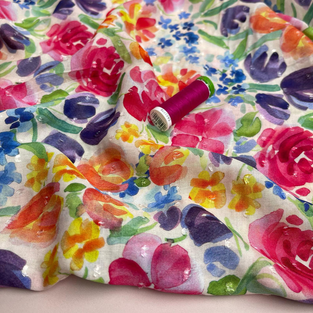 Spring Garden Blooms on White Dobby Viscose Fabric