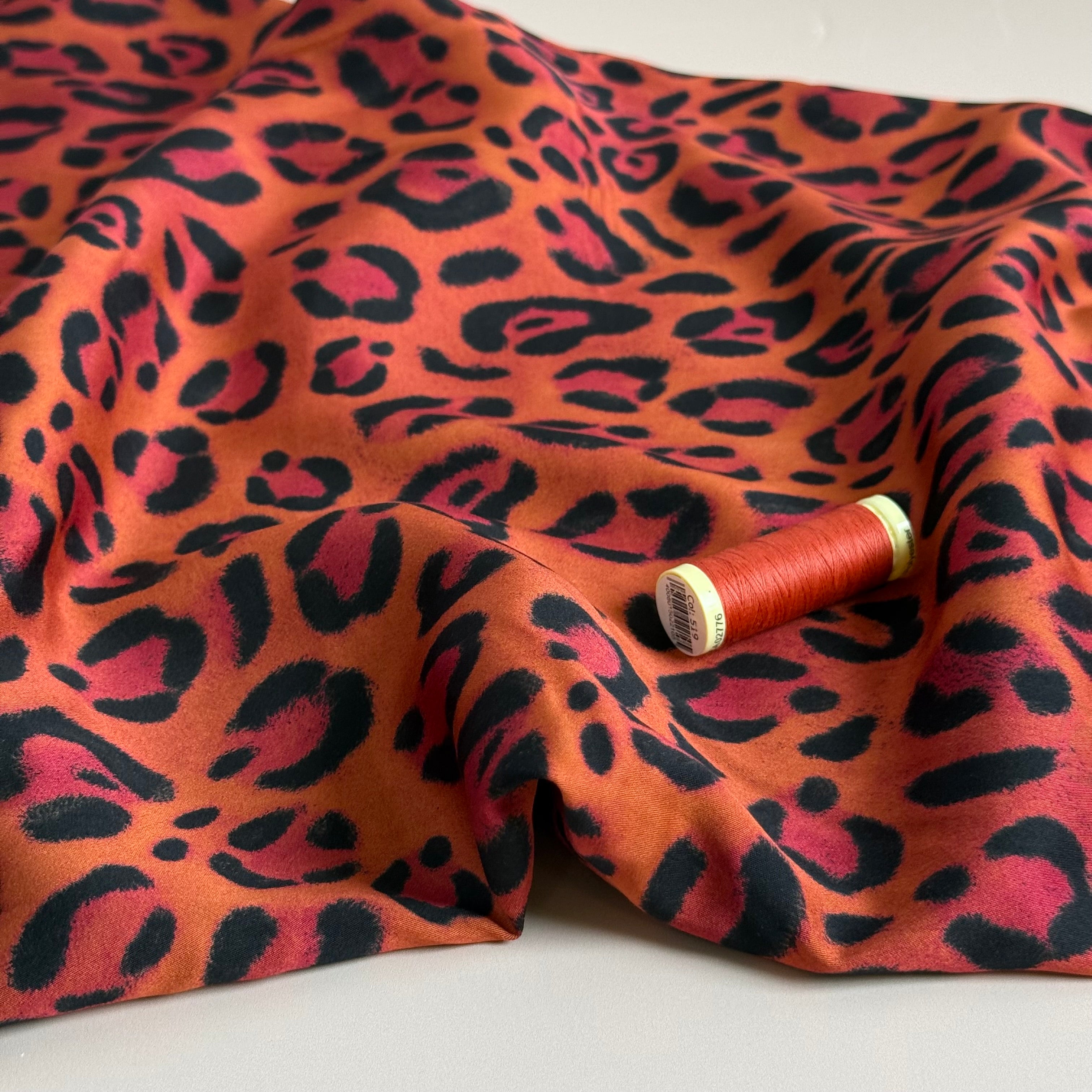 Animal Print Orange Viscose Sateen Fabric