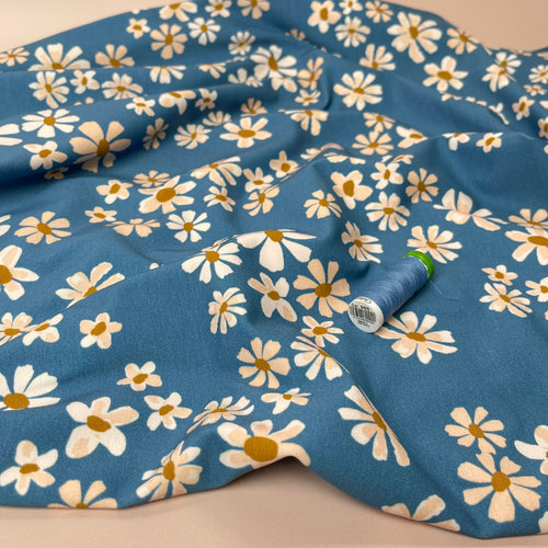 Danish Design - White Flowers on Blue Cotton Jersey Fabric