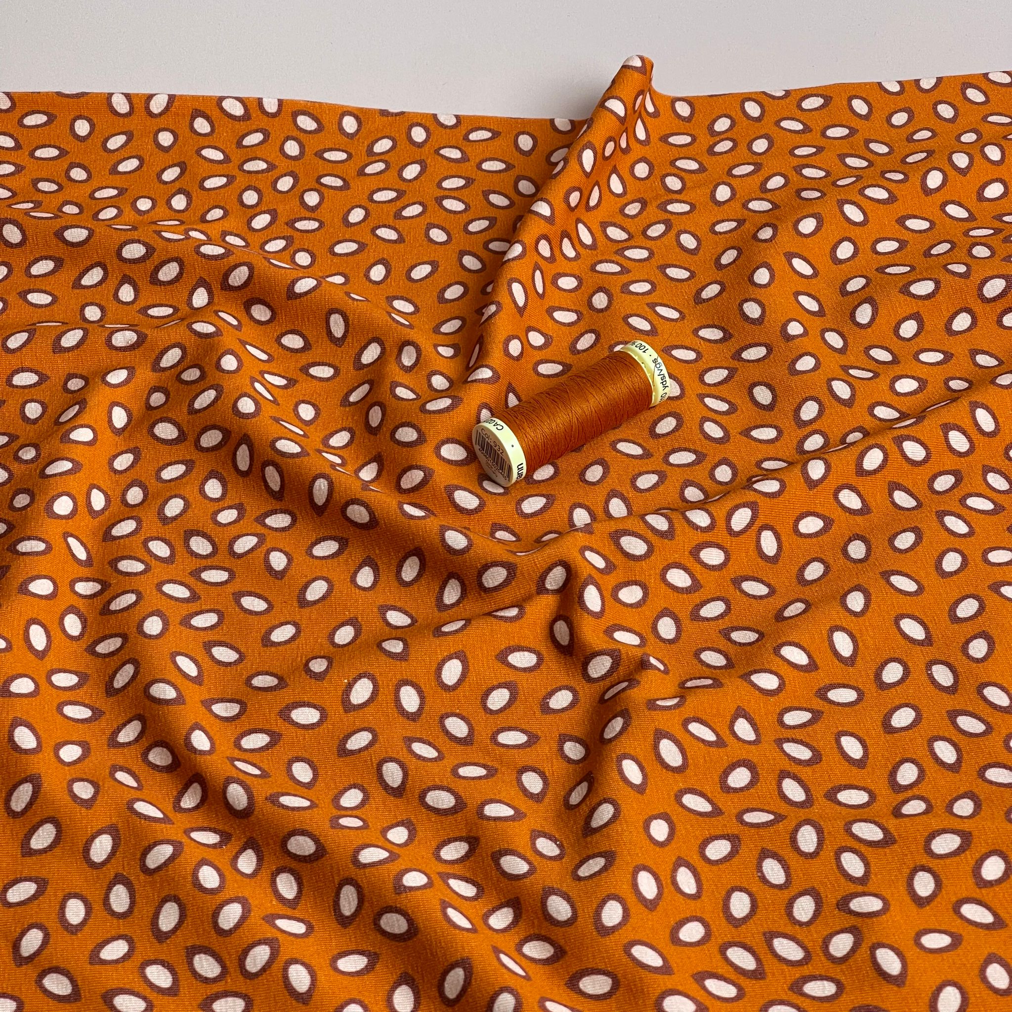 Danish Design - Small Petals on Rust Cotton Jersey Fabric