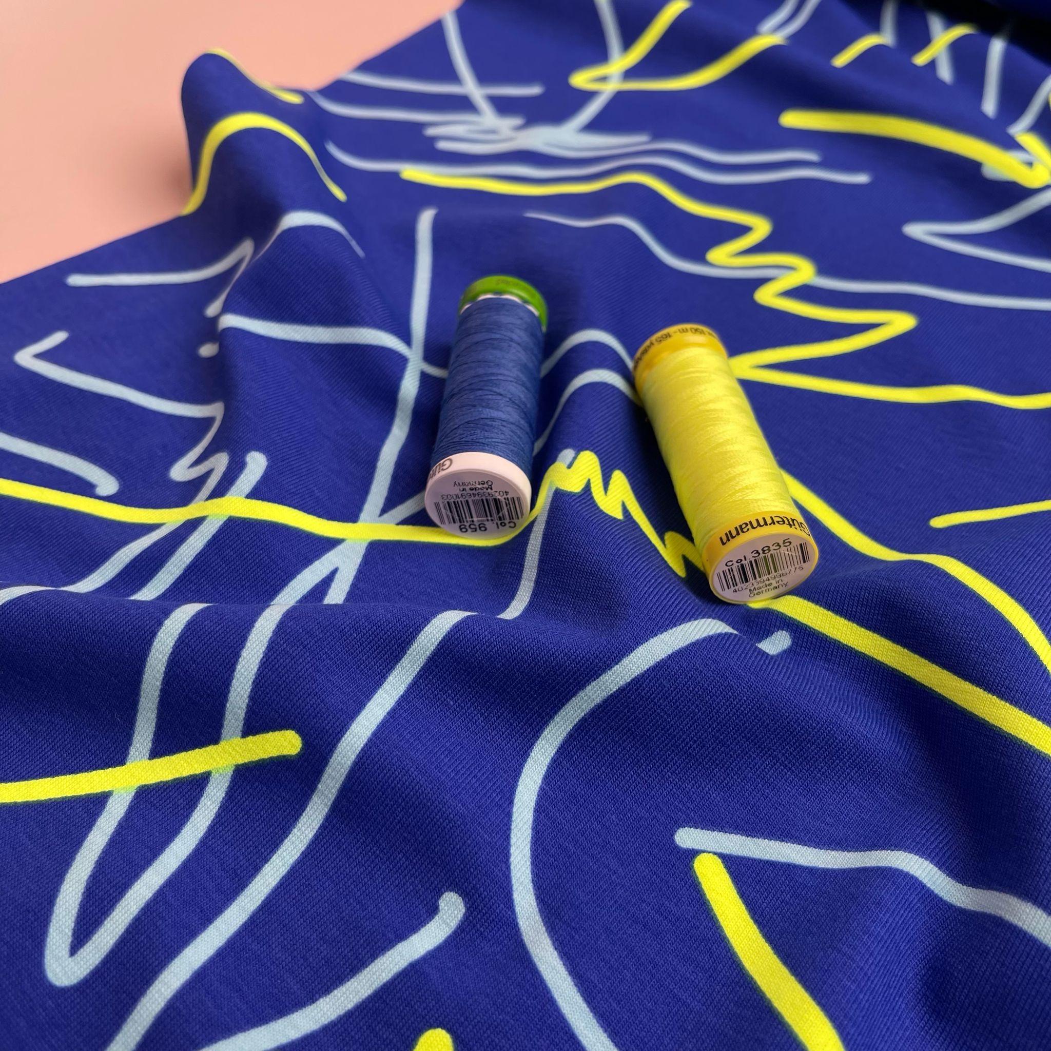 REMNANT 0.4 Metre - Neon Doodles on Blue Cotton Jersey Fabric