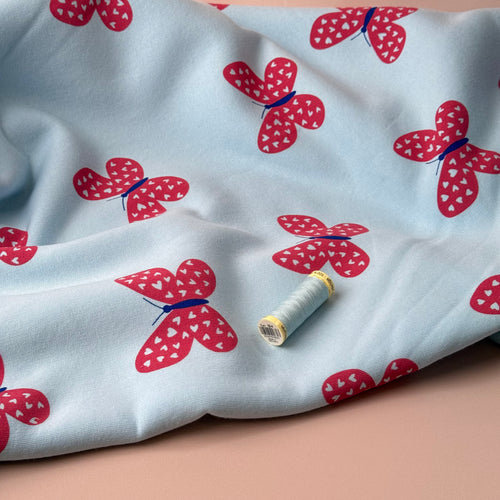 Butterflies on Icy Blue Soft Cotton Sweat-shirting Fabric