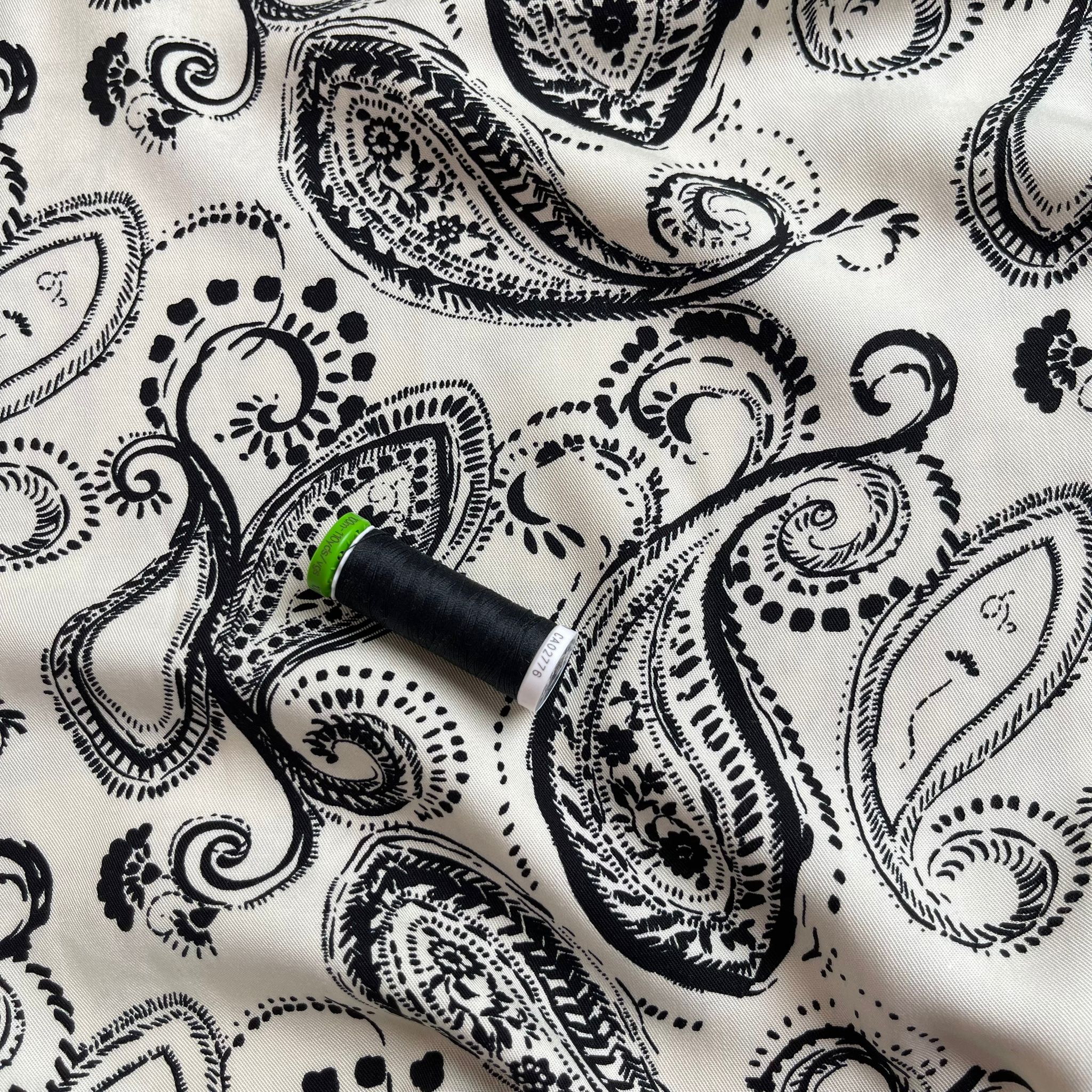 Black Paisley on Off-White Viscose Twill Fabric