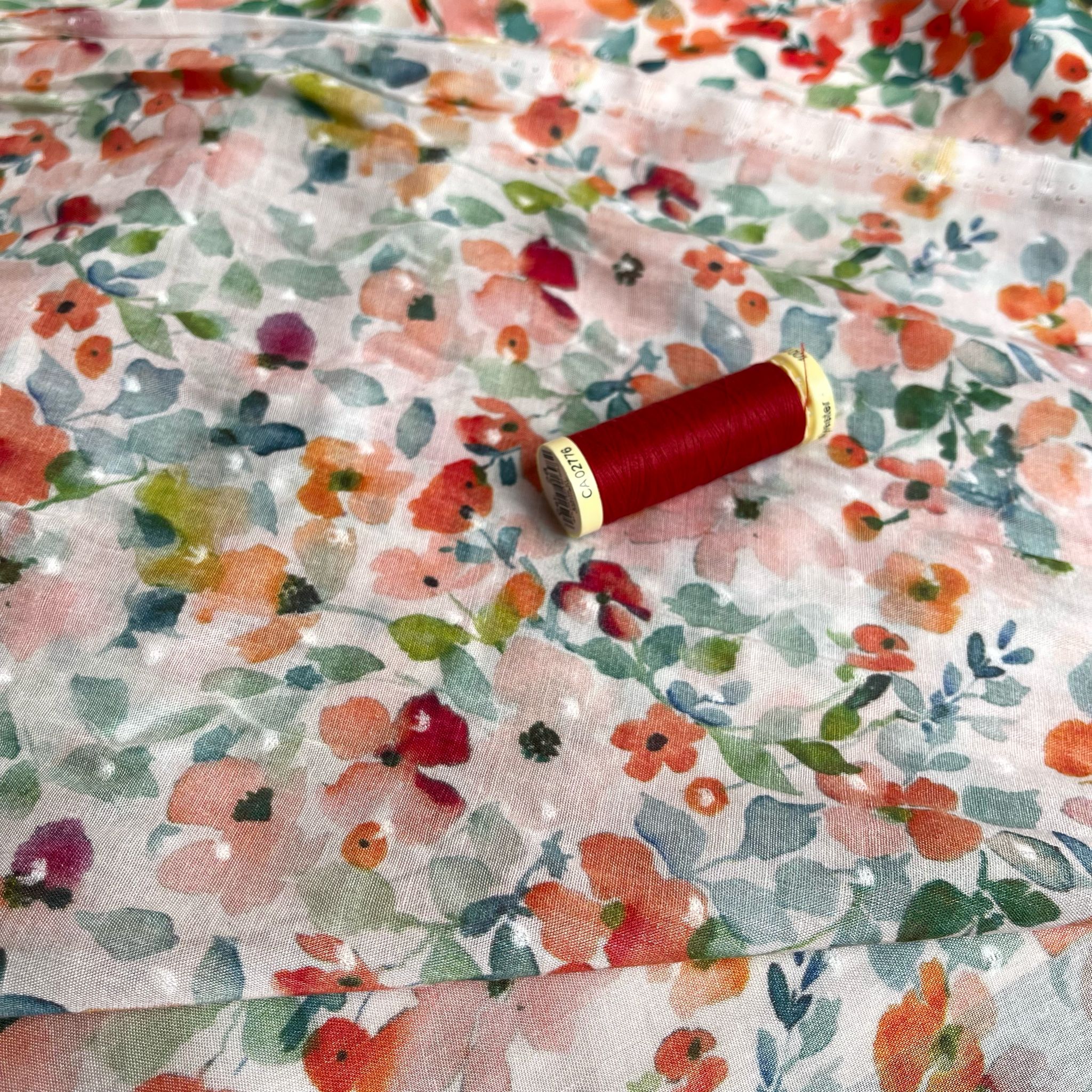 Poppy Field Blossoms on White Dobby Viscose Fabric