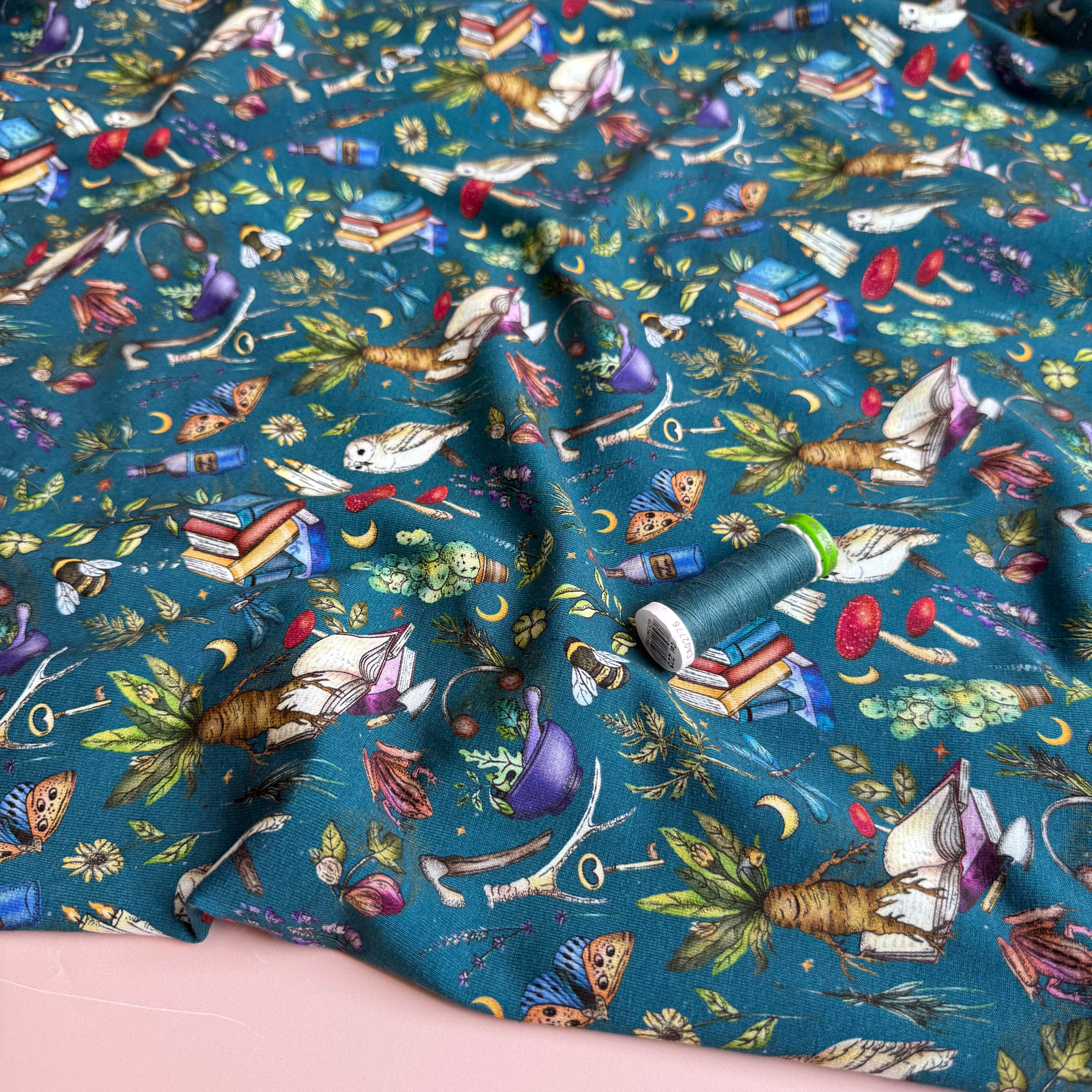 Magical Symbols Teal Cotton Jersey Fabric