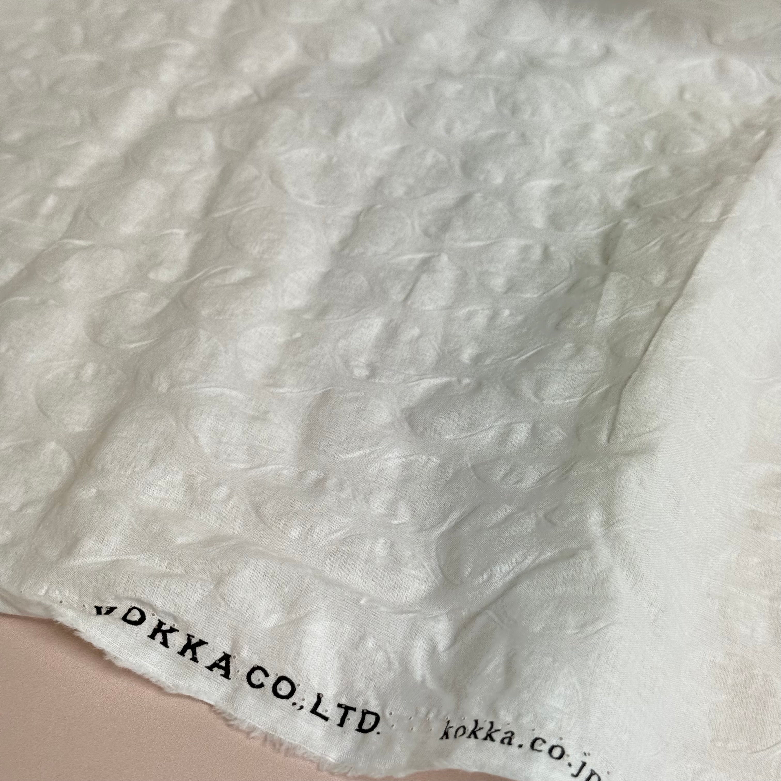 Kokka - Textured Circles Ripple Cotton Lawn in Off-White