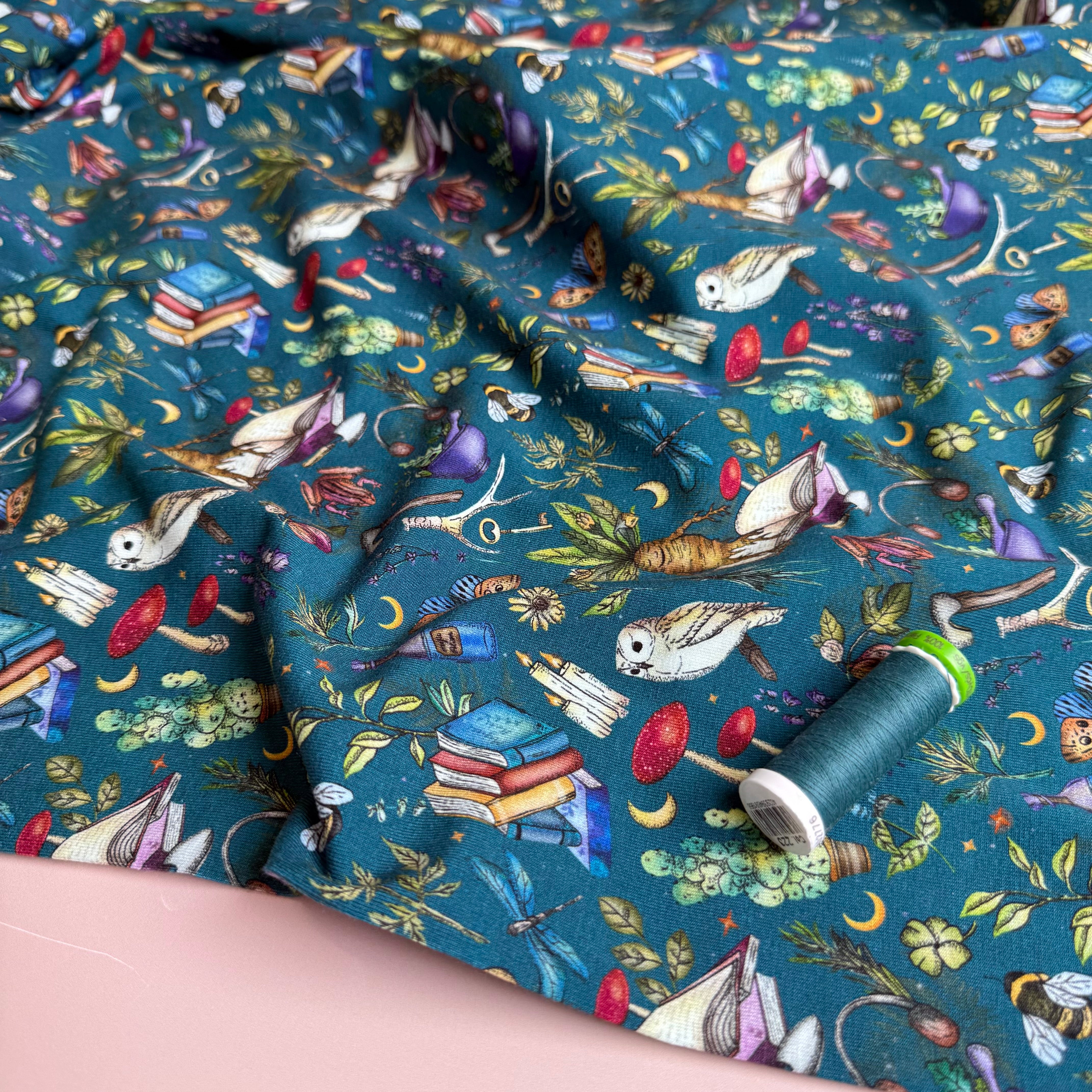 Magical Symbols Teal Cotton Jersey Fabric