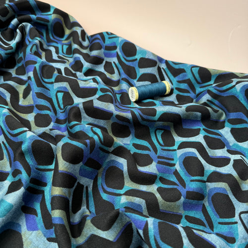 Graphic Swirls in Petrol Soft Ponte Interlock Jersey Fabric