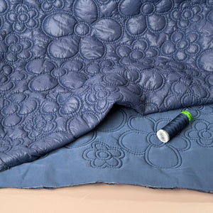 Flowers on Navy Quilted Puffer Fabric