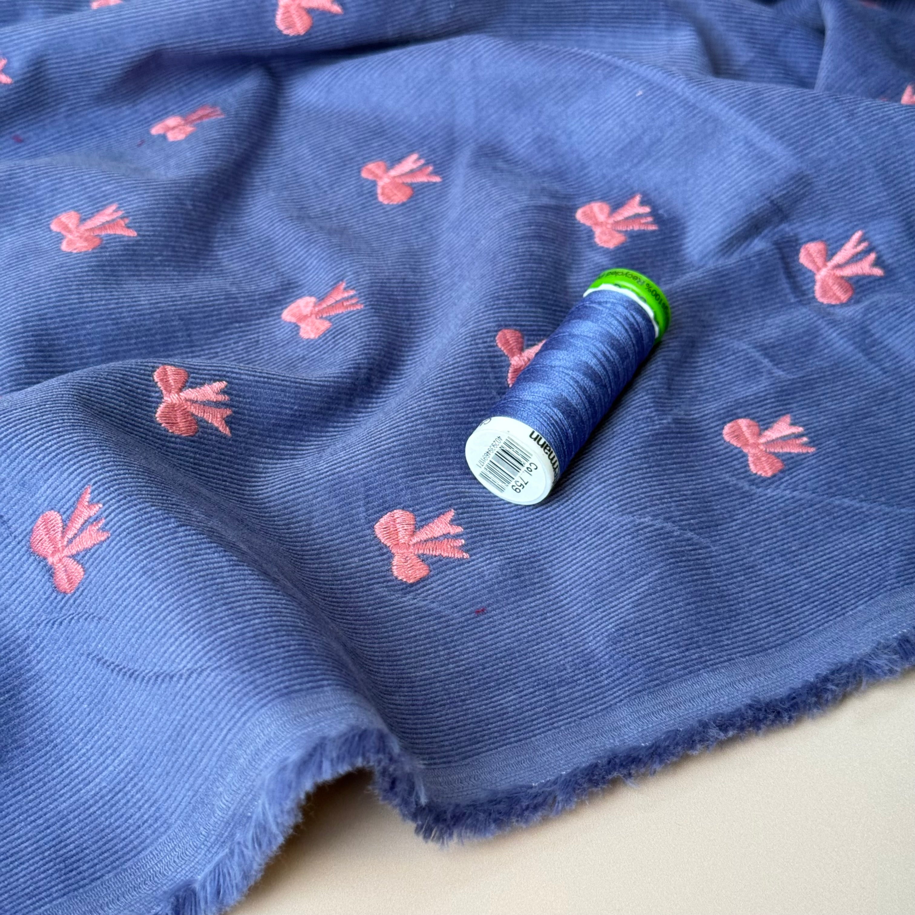 Embroidered Bows on Cornflower Blue Cotton Needlecord